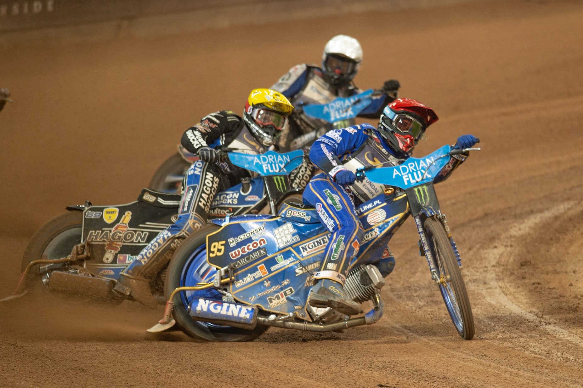 CARDIFF,WALES Bartoz Zmarzlik (Red) leads Jason Doyle (Yellow) and Matej Zagar (White)  in Semi Final 2 during the ADRIAN FLUX BRITISH FIM SPEEDWAY GRAND PRIX at the Principality Stadium, Cardiff on Saturday 21st September 2019. (Credit: Ian Charles | MI News)