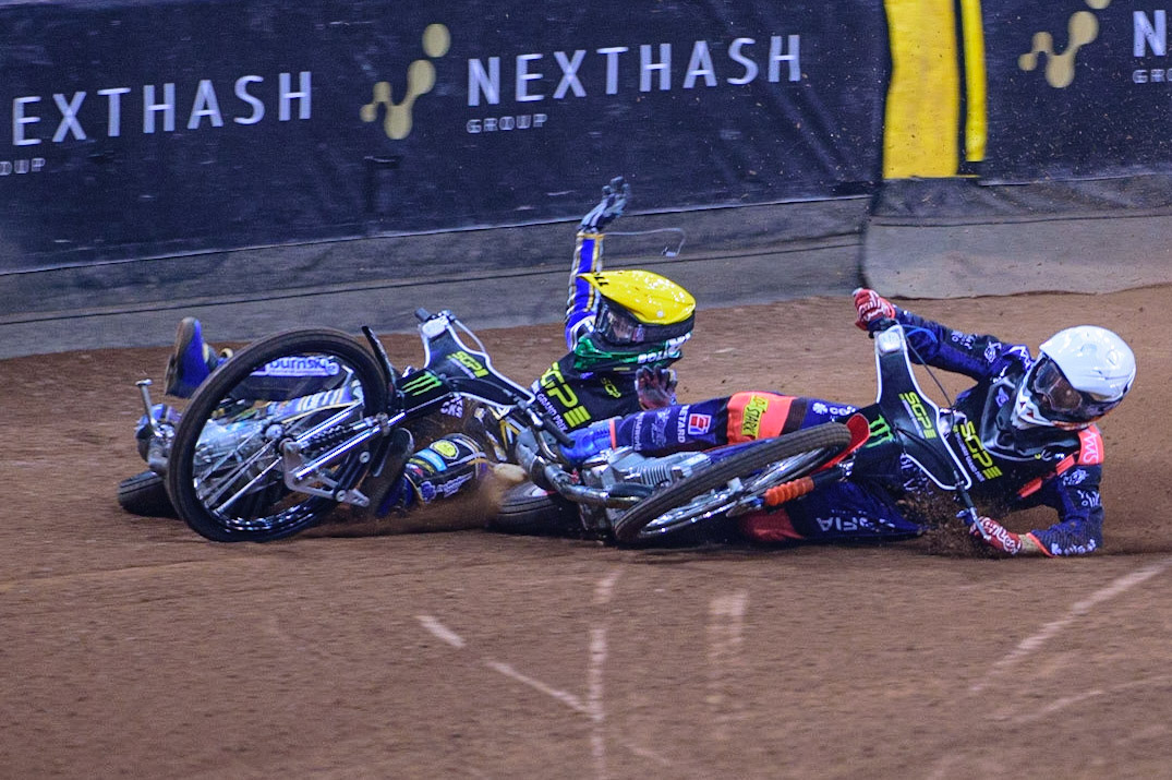 Andžejs Ļebedevs (29) (White) collides with Jason Doyle (69) (Yellow) on the opening turn during the FIM  Speedway Grand Prix of Great Britain at the Principality Stadium, Cardiff on Saturday 13th August 2022. (Credit: Ian Charles | MI News