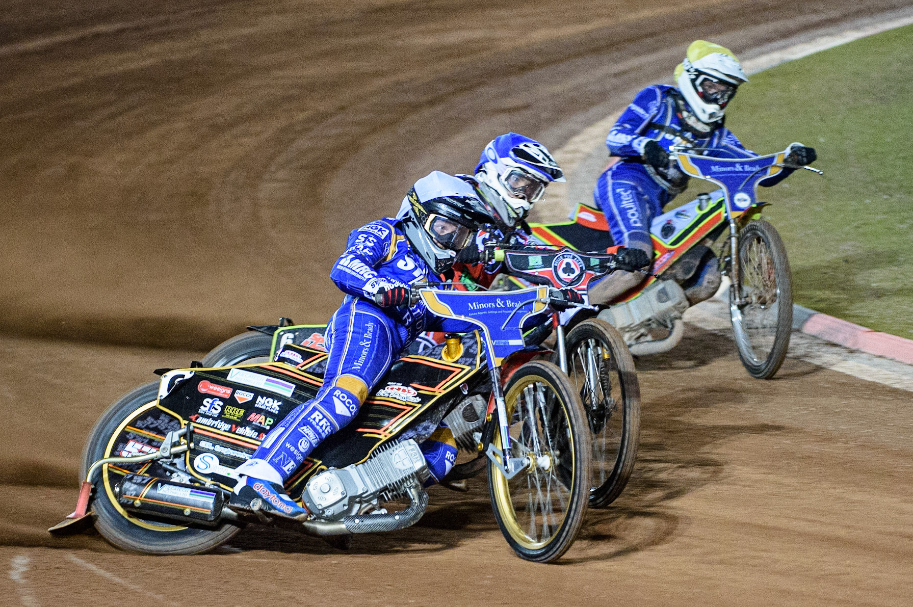 MANCHESTER, UK. SEPT 13TH  Connor Mountain  (White) outside Tom Brennan  (Blue) and Kasper Andersen (Yellow) during the SGB Premiership match between Belle Vue Aces and King's Lynn Stars at the National Speedway Stadium, Manchester on Monday 13th September 2021. (Credit: Ian Charles | MI News)