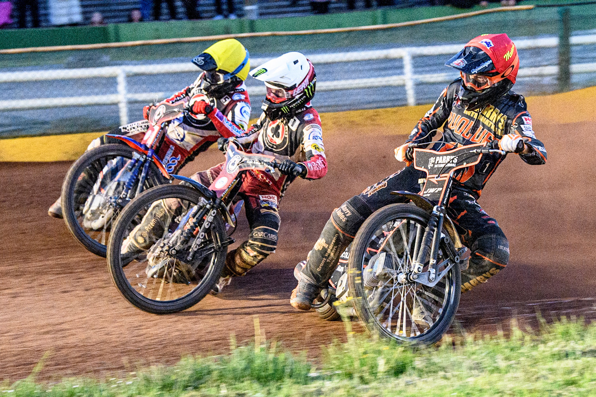 Sam Masters (Red) inside Dan Bewley (White) and Brady Kurtz (Yellow) during the Sports Insure Premiership match between Wolverhampton Wolves and Belle Vue Aces at Monmore Green Stadium, Wolverhampton on Monday 29th May 2023. (Photo: Ian Charles | MI News)