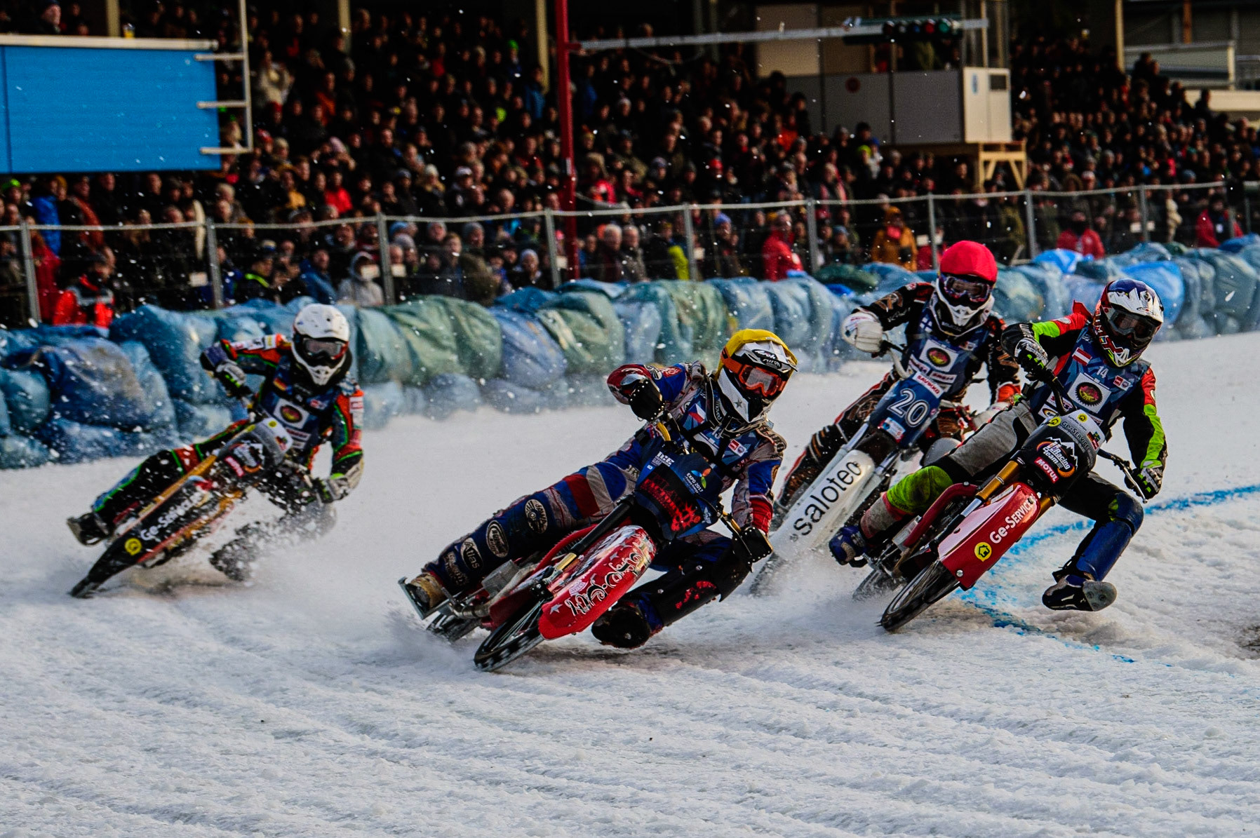 Jan Klatovsky (Yellow) outside Harald Simon (Blue) with Markus Jell (White) and Artturi Ervasti (Red) during the German Individual Ice Speedway Championship at Horst-Dohm-Eisstadion, Berlin on Friday 3rd March 2023. (Photo: Ian Charles | MI News)