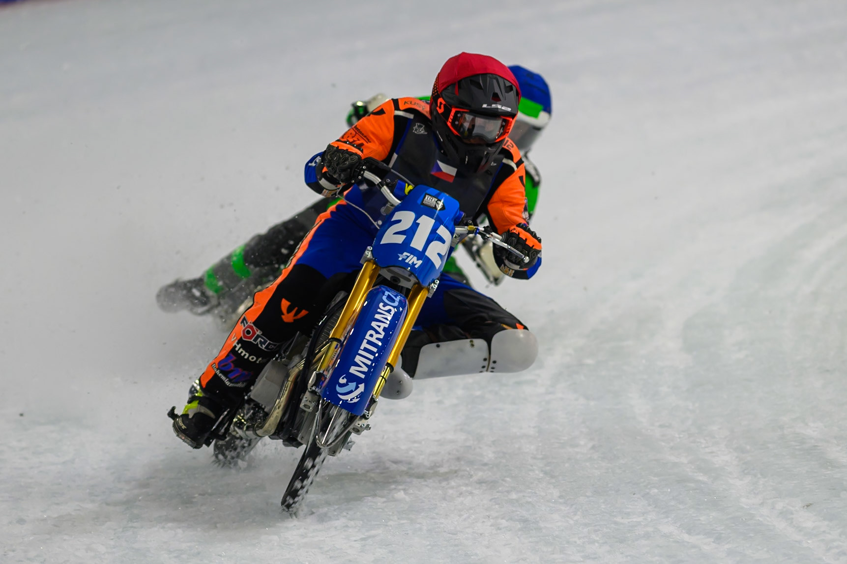 Lukas Hutla (212) of Czechia hits a rut in the ice in front of Andrej Divis (107) of Czechia in Blue during the FIM Ice Speedway Gladiators World Championship Final 3 at Ice Rink Thialf, Heerenveen on Saturday 11th April 2026. (Photo: Ian Charles | MI News)