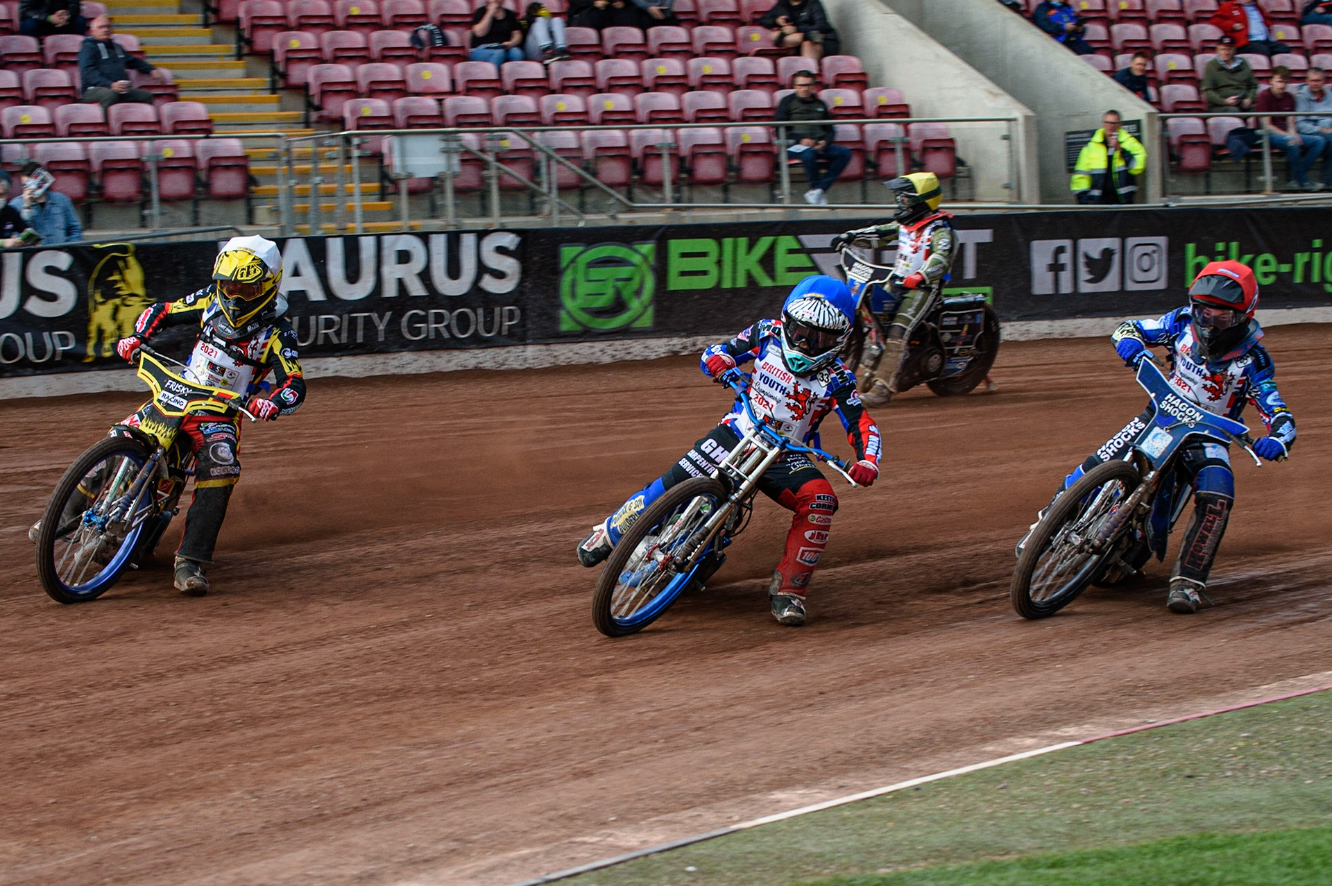 MANCHESTER, UK. MAY 28TH   Max James  (White) outside Charlie Wood (Blue)and Jody Scott  (Red) with Ashton Vale   (Yellow) behind  during the British Junior Championship at the National Speedway Stadium, Manchester on Friday 28th May 2021. (Credit: Ian Charles | MI News)