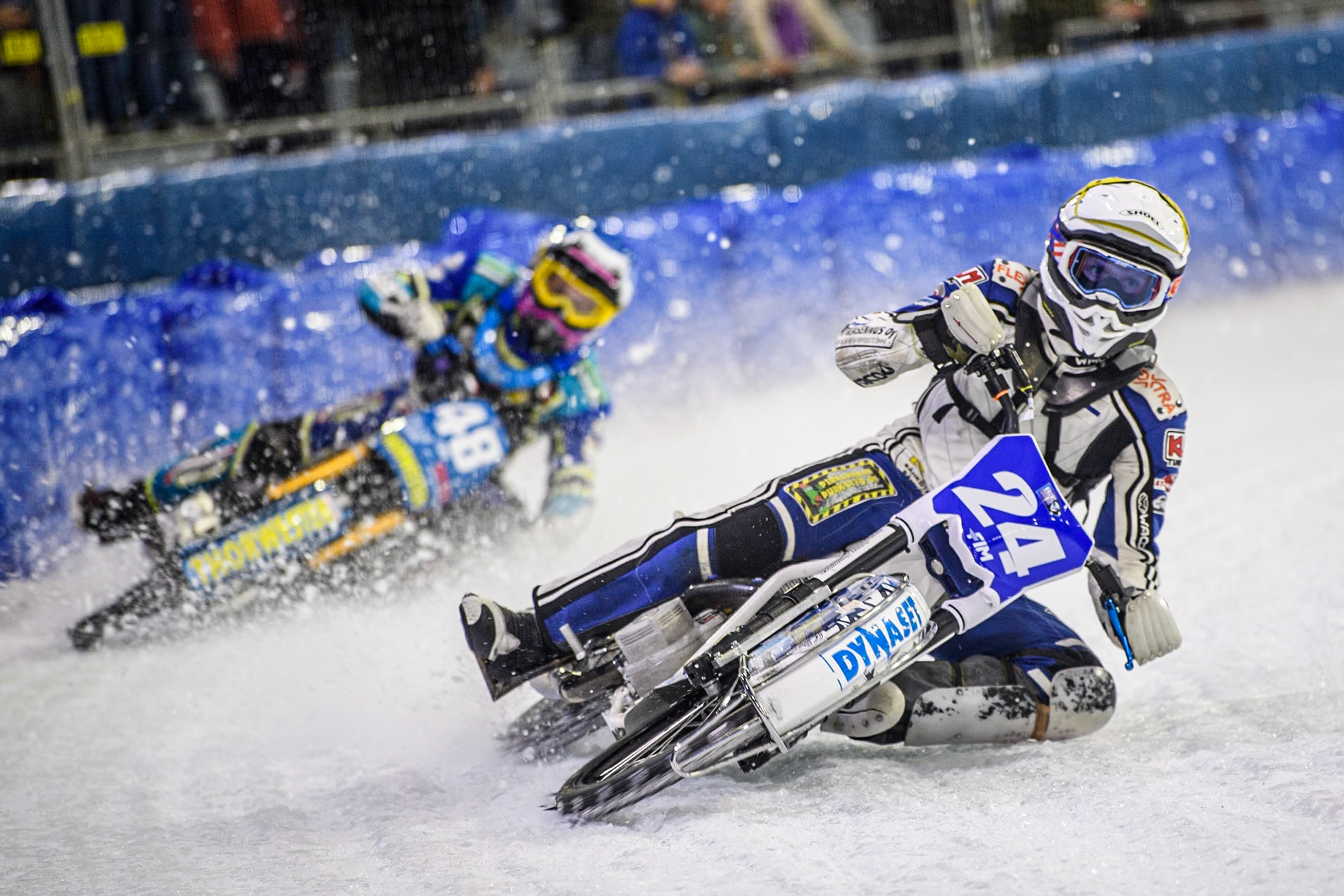 Max Koivula (24) of Finland in Yellow leading Luca Bauer (48) of Germany in Blue during the FIM Ice Speedway Gladiators World Championship, Final 4 at the Ice Stadium, Thialf, Heerenveen on Sunday 6th April 2025. (Photo: Ian Charles | MI News)