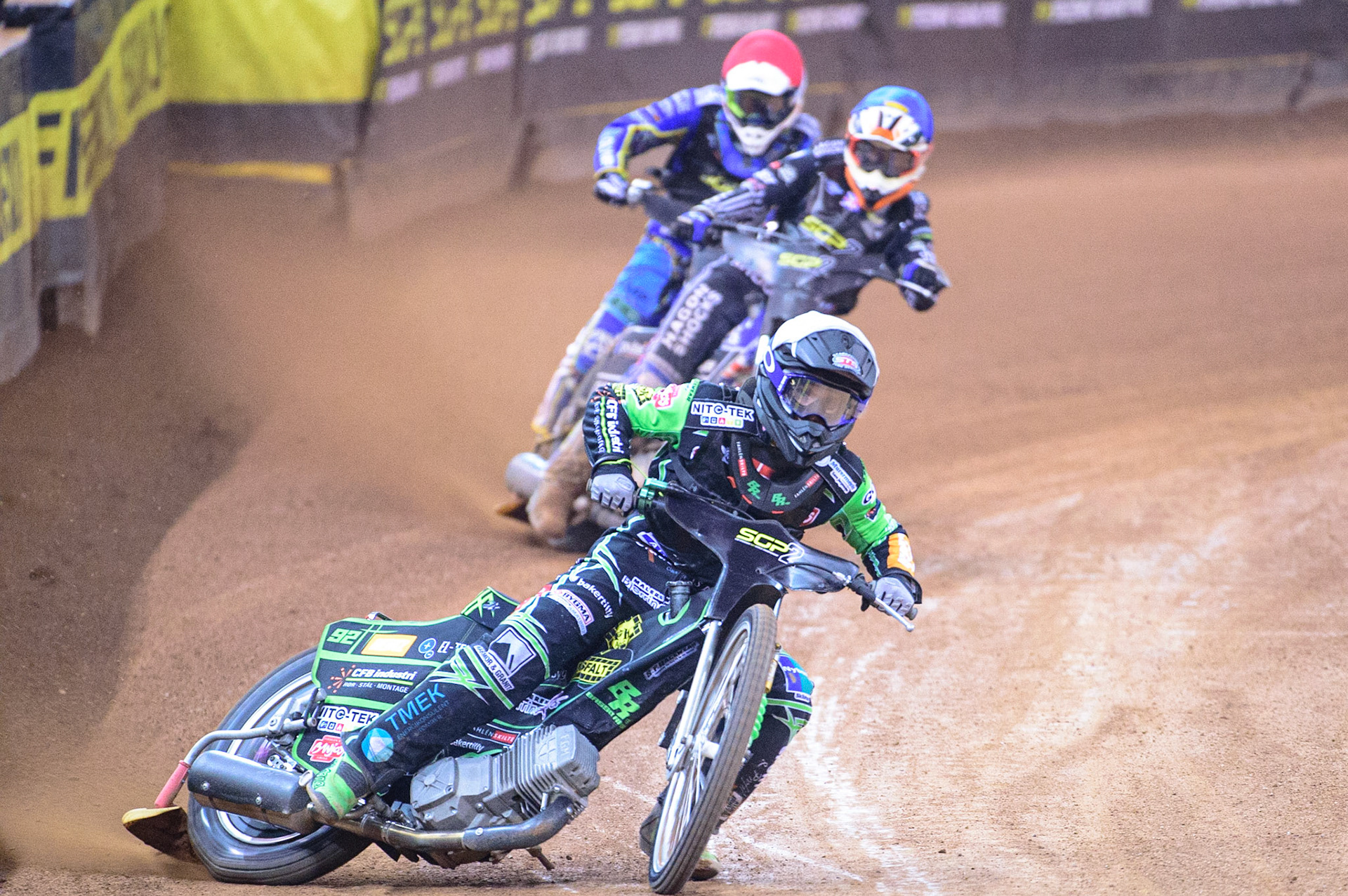 Benjamin Basso (Denmark)  leads Jason Edwards (Great Britain) with Petr Chlupac (Czech Republic) (Red) behind during the FIM  Speedway Grand Prix  2 of Great Britain at the Principality Stadium, Cardiff on Sunday 14th August 2022. (Credit: Ian Charles | MI News)