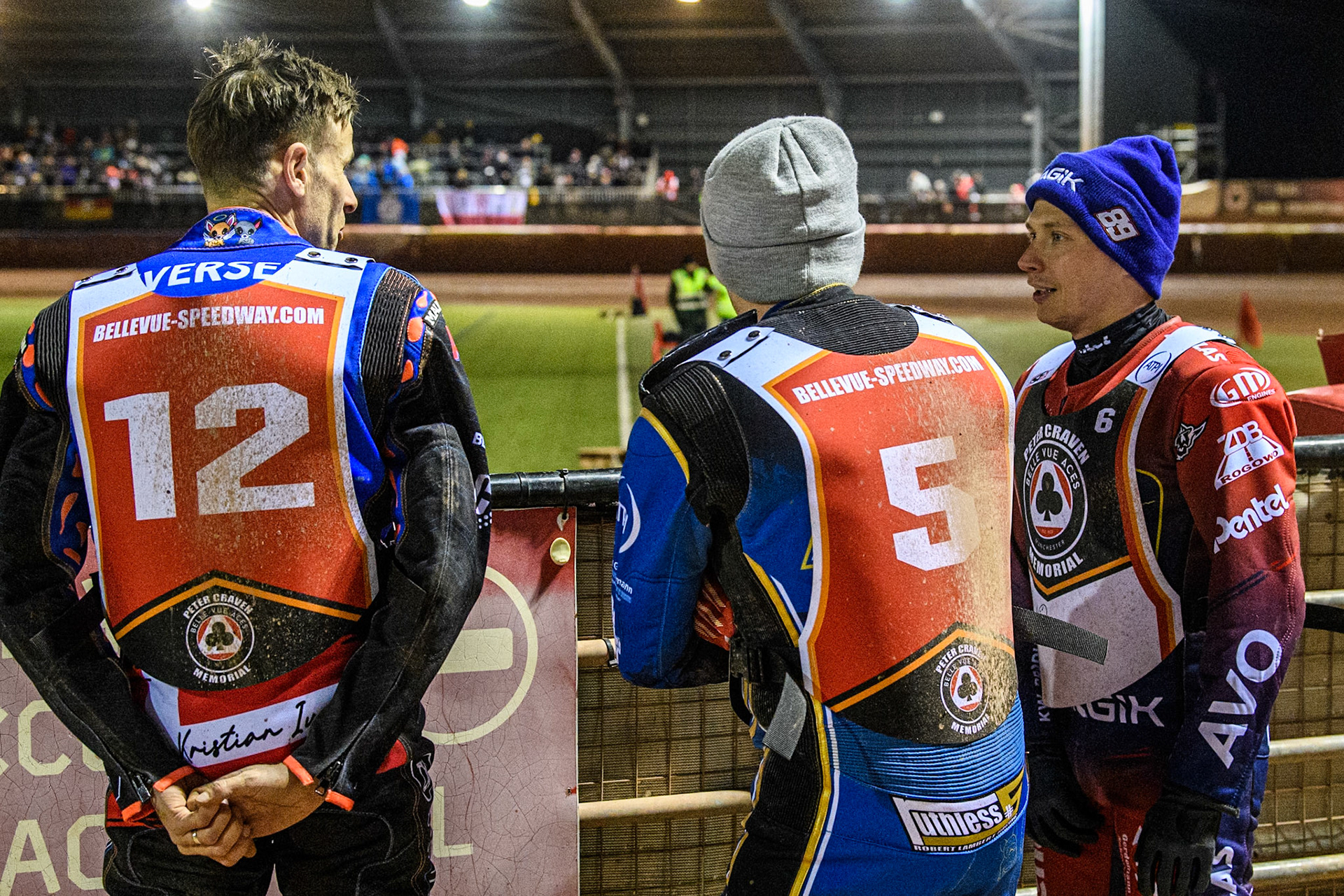 (L to R) Niels-Kristian Iversen, Robert Lambert and Emil Sayfutdinov watch the track prep during the Peter Craven Memorial Trophy at the National Speedway Stadium, Manchester on Monday 17th March 2025. (Photo: Ian Charles | MI News)