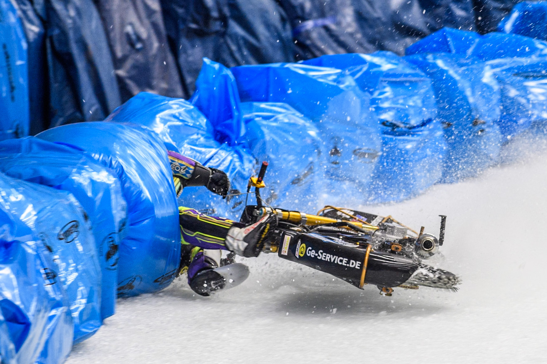 Max Niedermaier  (88) of Germany spins off and hits the bales during the Ice Speedway Gladiators World Championship Final 1 at Max-Aicher-Arena, Inzell on Saturday 15th March 2025. (Photo: Ian Charles | MI News)