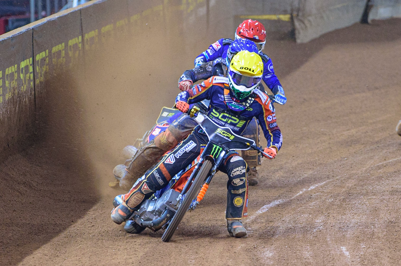 Mikkel Michelsen (155) (Yellow) leads Andžejs Ļebedevs (29) (Blue) and Robert Lambert (505) (Red) during the FIM  Speedway Grand Prix of Great Britain at the Principality Stadium, Cardiff on Saturday 13th August 2022. (Credit: Ian Charles | MI News