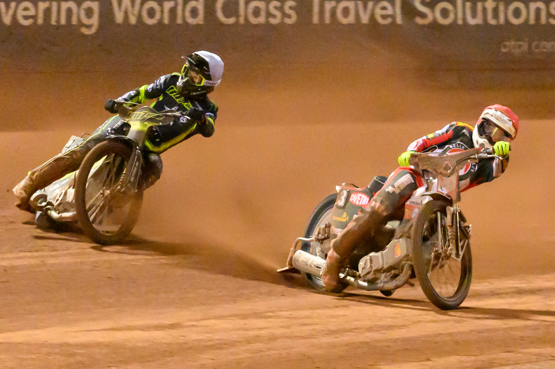 Peter Kildemand of Belle Vue Aces in Red on the inside of Tobias Musielak of Ipswich Witches in White during the Rowe Motor Oil Premiership Play Off Semi Final 2nd leg match between Belle Vue Aces and Ipswich Witches at the National Speedway Stadium, Manchester on Monday 28th September 2026. (Photo: Ian Charles | MI News)