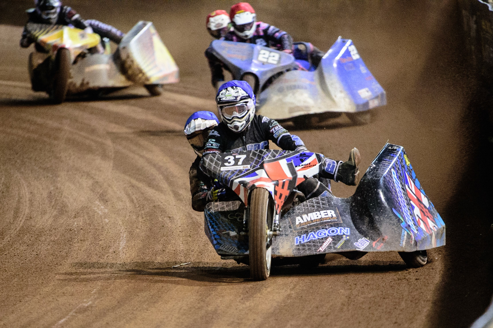 MANCHESTER, UK. OCT 30TH   Mark Cossar &amp; Gareth Williams (Blue) leads Will Penfold &amp; Ricky Pay (Red) and Tom Cossar &amp; Wayne Rickards  (White) during the Manchester Masters Sidecar Speedway and Flat Track Racing at the National Speedway Stadium, Manchester on Saturday 30th October 2021. (Credit: Ian Charles | MI News)