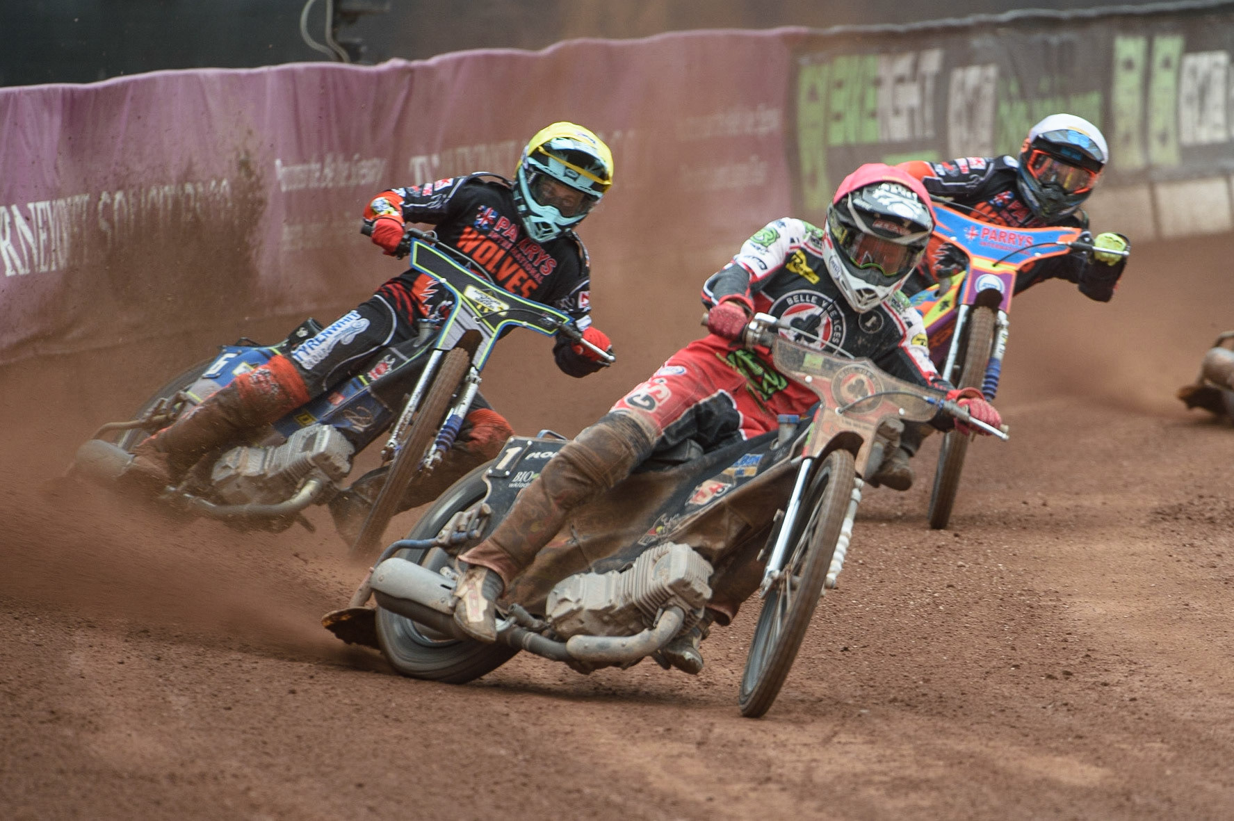 MANCHESTER, UK. AUGUST 30TH Dan Bewley  (Red) leads Ryan Douglas  (Yellow) and Rory Schlein  (White)  during the SGB Premiership match between Belle Vue Aces and Wolverhampton Wolves at the National Speedway Stadium, Manchester on Monday 30th August 2021. (Credit: Ian Charles | MI News)