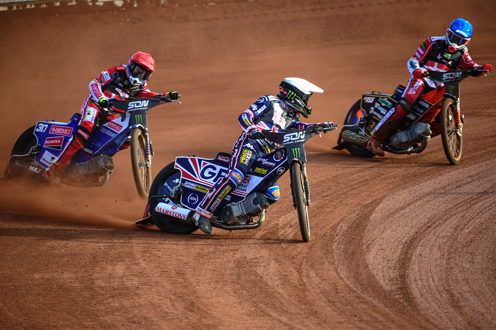 MANCHESTER, UK. OCT 16TH Tai Woffinden of Great Britain (White) leads Leon Madsen of Denmark (Red) and Mikkel Michelsen of Denmark (Blue) during the Monster Energy FIM Speedway of Nations at the National Speedway Stadium, Manchester on Saturday  16th October 2021. (Credit: Ian Charles | MI News)