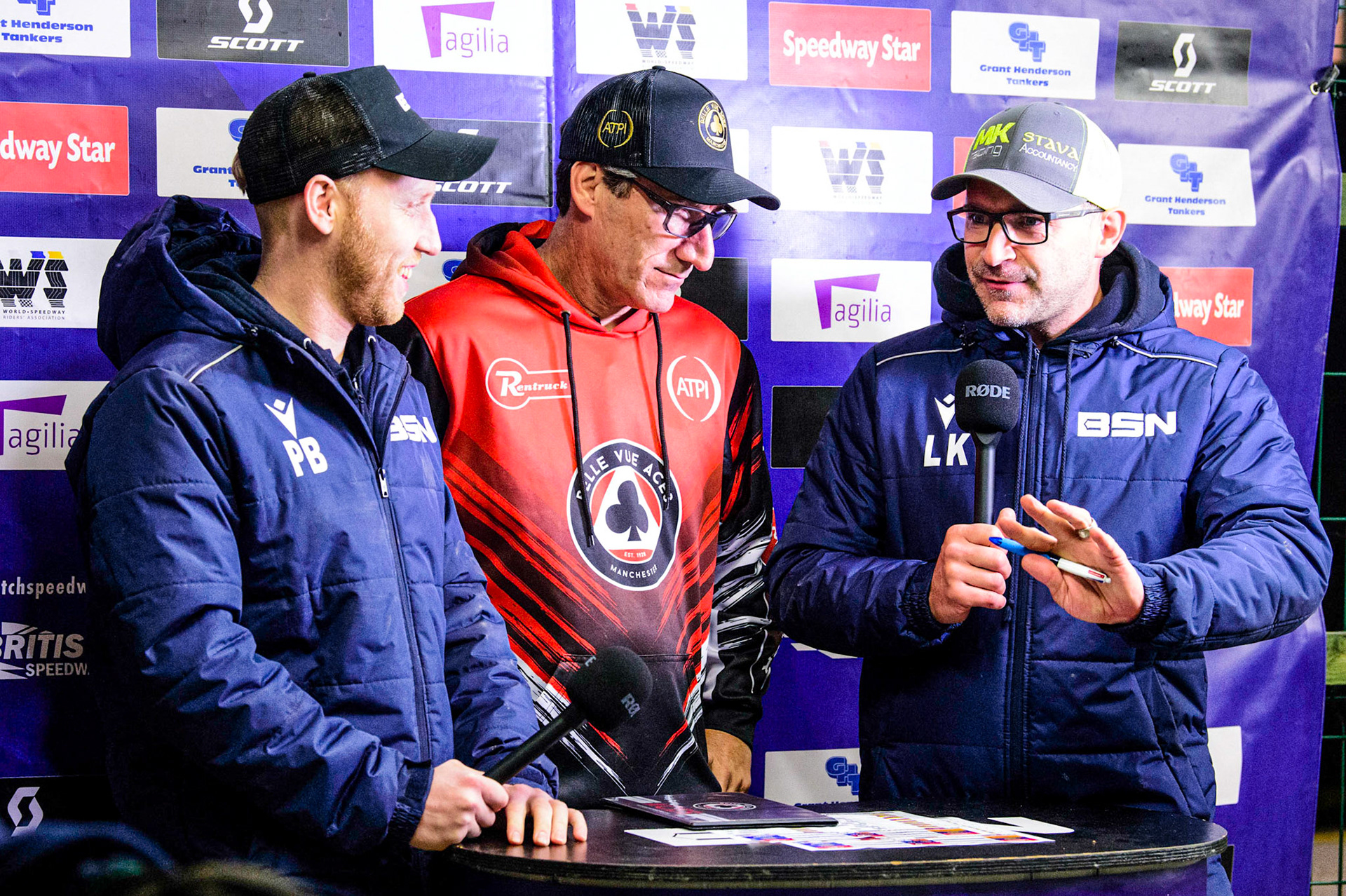 Mark Lemon (Centre) is interviewed by the BSN presenters Paul Bowen (left) and Lee Kilby (right) during the Grant Henderson Pairs at the National Speedway Stadium, Manchester on Thursday 27th October 2022. (Credit: Ian Charles | MI NEWS)