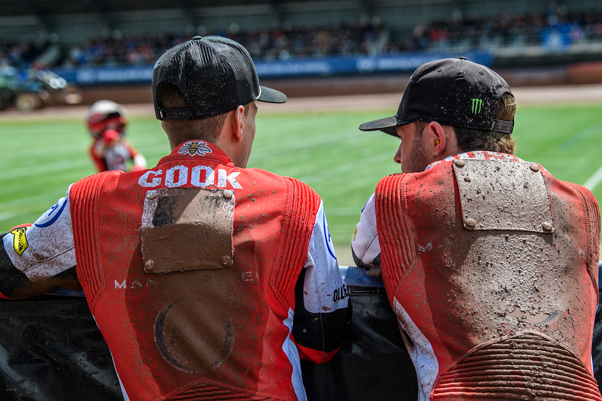 Belle Vue Aces' Ben Cook (Left) and Belle Vue Aces' Jaimon Lidsey watch the track prep after the fourth heat during the Rowe Motor Oil Premiership match between Belle Vue Aces and Sheffield Tigers at the National Speedway Stadium, Manchester on Monday 27th May 2024. (Photo: Ian Charles | MI News)