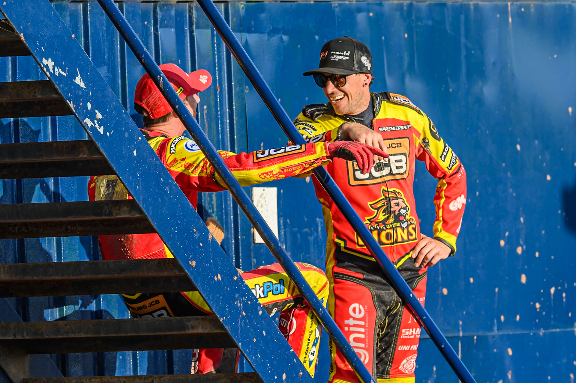Leicester Lions' Sam Masters (Right) chats with team mate Max Fricke during the Rowe Motor Oil Premiership match between Leicester Lions and Belle Vue Aces at the Hydroscand Arena, Leicester on Thursday 19th June 2025. (Photo: Ian Charles | MI News)