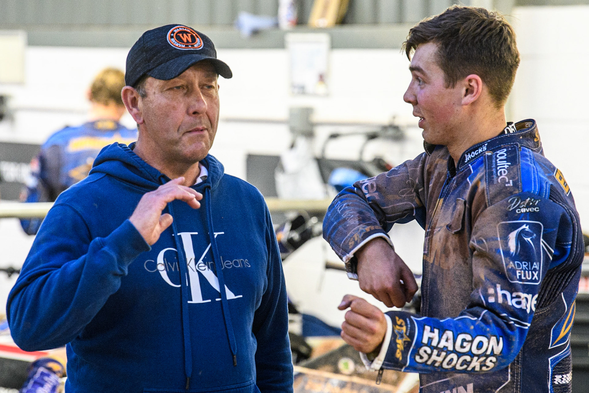 King’s Lynn MacInnes Stars team manager Rob Lyon (left) chats with Jason Edwards during the Sports Insure Premiership match between Belle Vue Aces and King's Lynn Stars at the National Speedway Stadium, Manchester on Monday 12th June 2023. (Photo: Ian Charles | MI News)