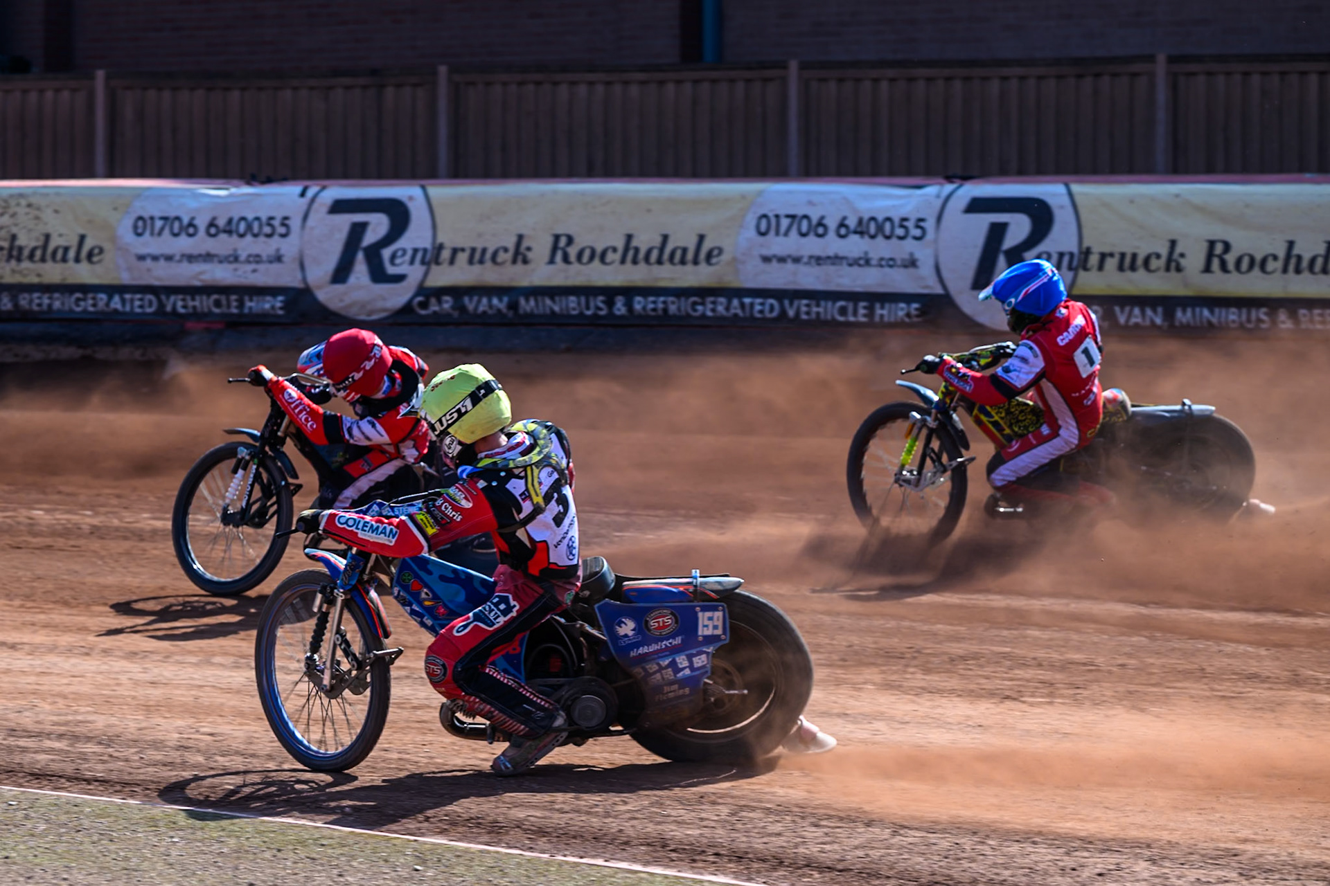 Stene Pijper of Middlesborough Tigers  in Yellow chases Freddy Hodder of Belle Vue Colts  in Red and William Cairns of Belle Vue Colts  in Blue during the WSRA National Development League match between Belle Vue Colts and Middlesbrough Tigers at the National Speedway Stadium, Manchester on Sunday 10th August 2025. (Photo: Mark Fletcher | MI News)