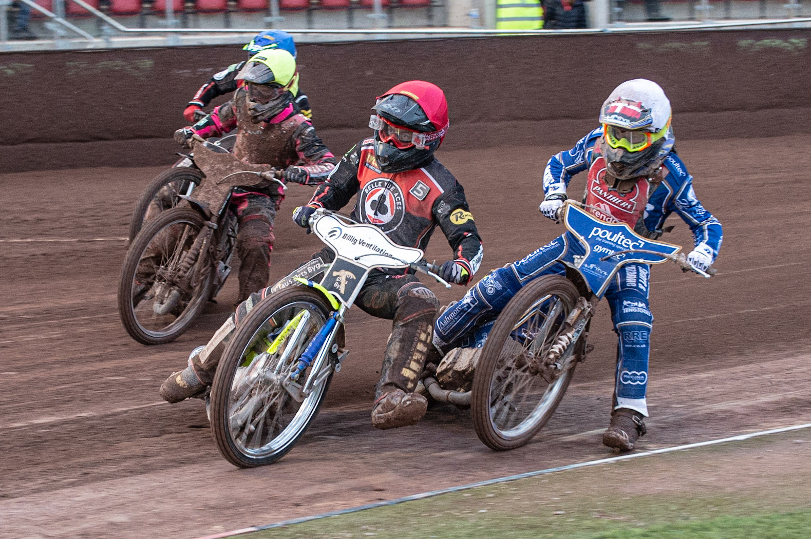 Photo by Ian Charles:

Belle Vue Aces  Kenneth Bjerre  (Red) blocks Michael Palm Toft (White) with Josh Bates  (Yellow) and Aaron Summers  (Blue) behind

Belle Vue Aces v Peterborough Panthers, British Speedway Premiership, National Speedway Stadium, Manchester, Thursday, 13, June, 2019