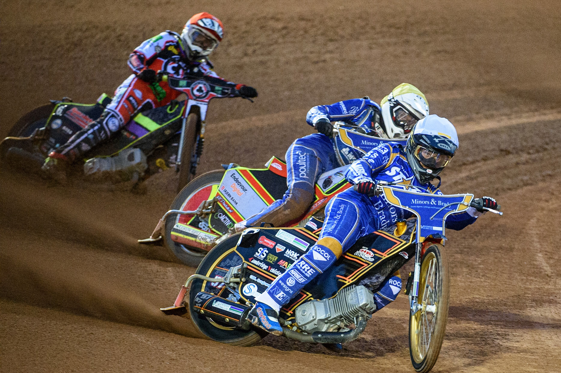 MANCHESTER, UK. SEPT 13TH  Connor Mountain  (White) and Kasper Andersen  (Yellow)l Tom Brennan  (Red) during the SGB Premiership match between Belle Vue Aces and King's Lynn Stars at the National Speedway Stadium, Manchester on Monday 13th September 2021. (Credit: Ian Charles | MI News)