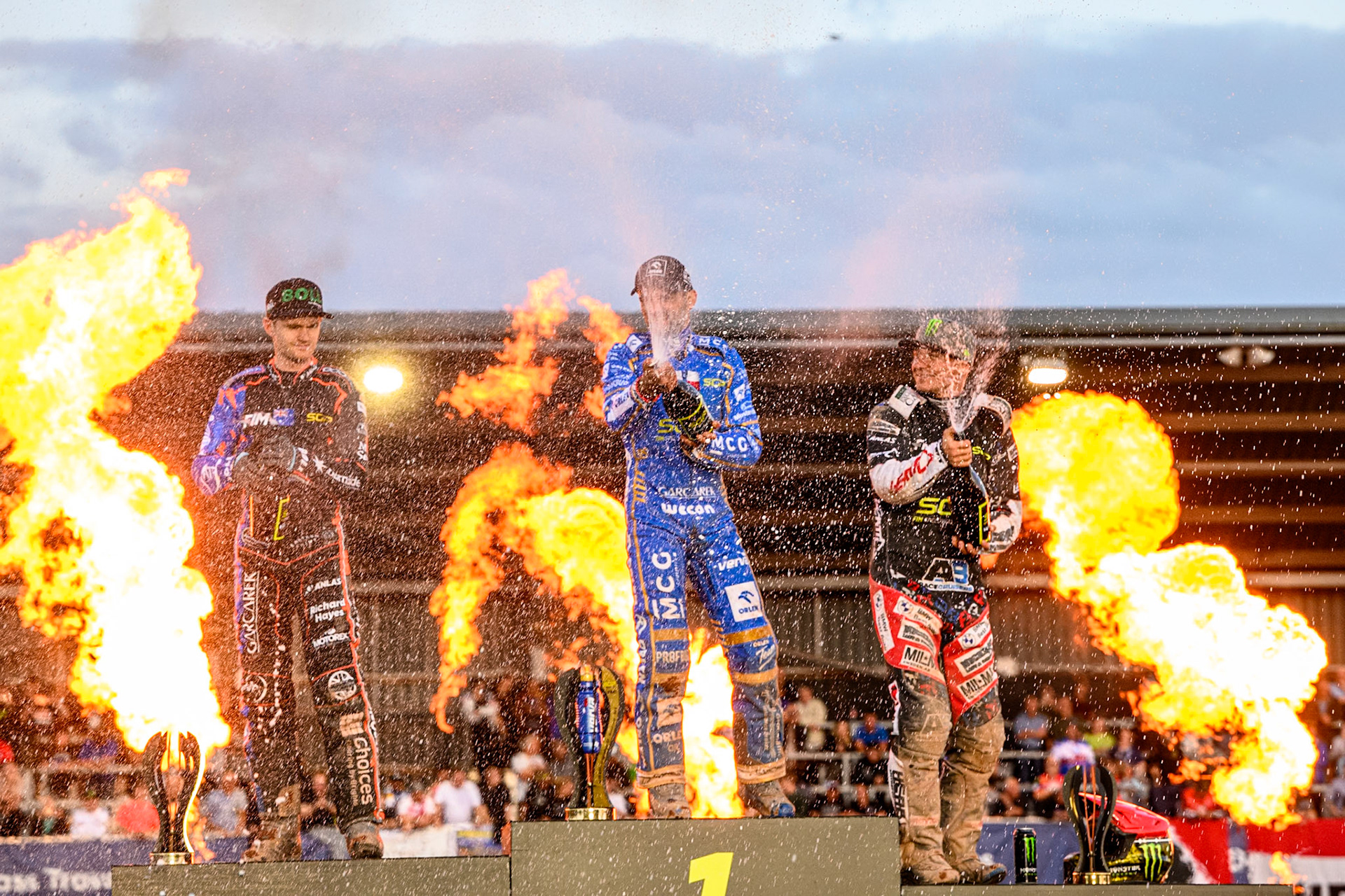Champagne Capers on the rostrum during the ATPI FIM Speedway Grand Prix Round 5 at the National Speedway Stadium, Manchester, on Saturday 14th June 2025. (Photo: Ian Charles | MI News)