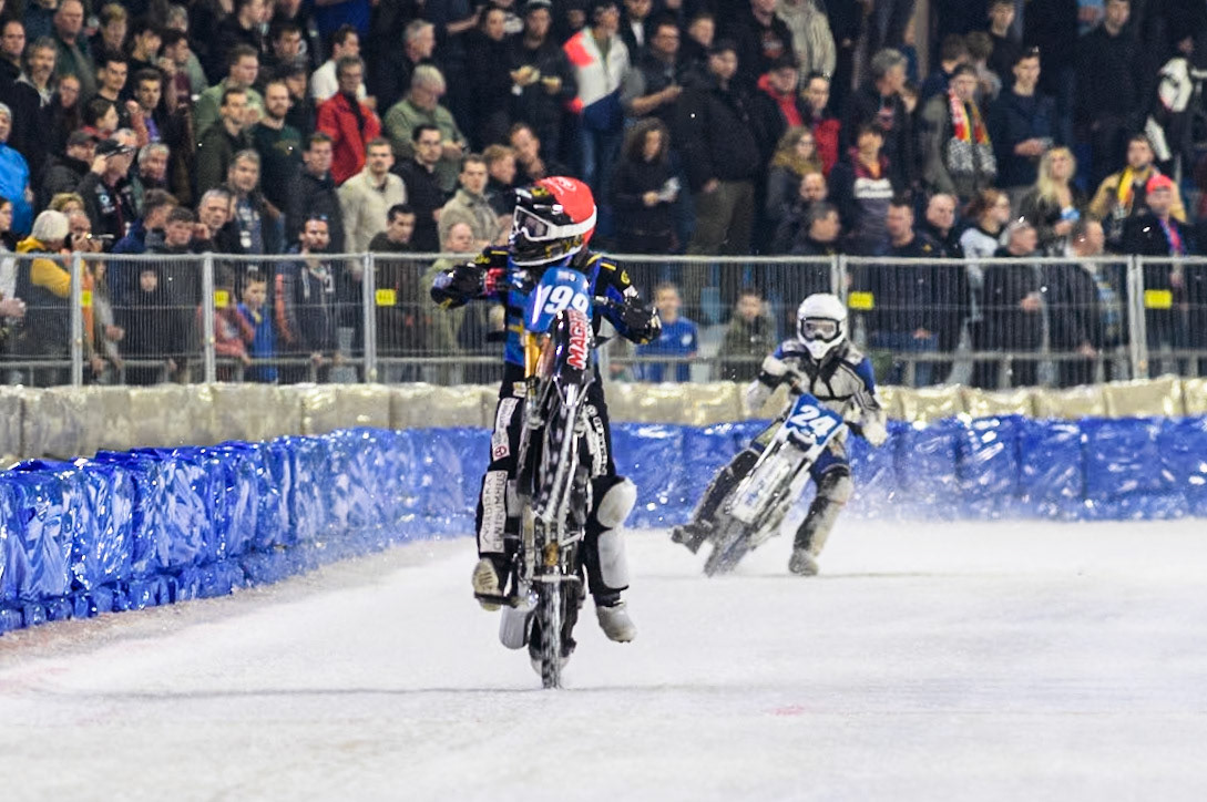 Sweden's Martin Haarahiltunen (199)  celebrates his win with a wheelie during the FIM Ice Speedway Gladiators World Championship Final 4 at Ice Rink Thialf, Heerenveen on Sunday 7th April 2024. (Photo: Ian Charles | MI News)