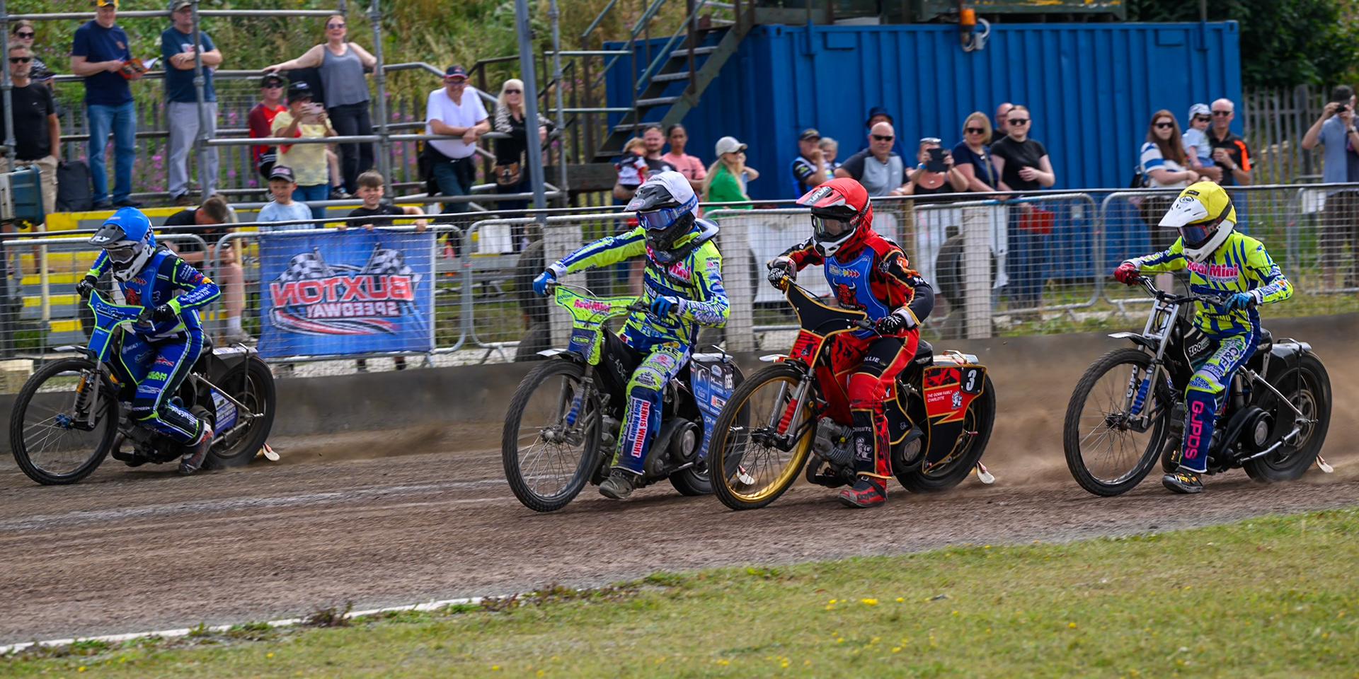 (L to R) Arran Butcher of Buxton Bulls in Blue , Jody Scott of Oxford Chargers in White Luke Harris of Buxton Bulls in Red  and Harry Fletcher of Oxford Chargers in Yellow leaving the start in heat 5 during the WSRA National Development League match between Buxton Bulls and Oxford Chargers at Hi-Edge Speedway, Buxton on Sunday 2nd August 2026. (Photo: Ian Charles | MI News)