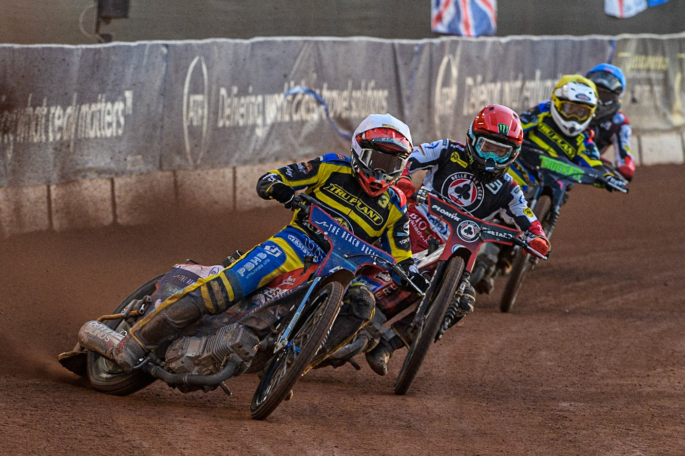 Adam Ellis (White) leads Dan Bewley (Red), Josh Pickering (Yellow) and Norick Blodorn (Blue) during the Sports Insure Premiership match between Belle Vue Aces and Sheffield Tigers at the National Speedway Stadium, Manchester on Monday 7th August 2023. (Photo: Ian Charles | MI News)