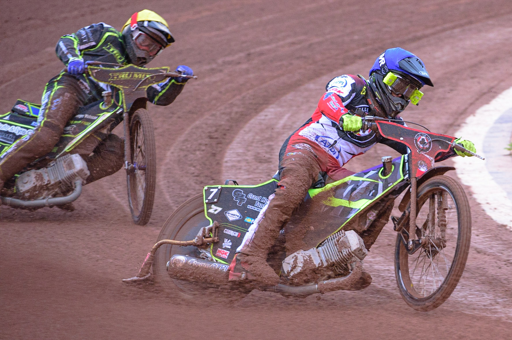 MANCHESTER, UK. JUN 6TH  Tom Brennan  (Blue) leads Danyon Hume  (Yellow) during the SGB Premiership match between Belle Vue Aces and Ipswich Witches at the National Speedway Stadium, Manchester on Monday 6th June 2022. (Credit: Ian Charles | MI News)