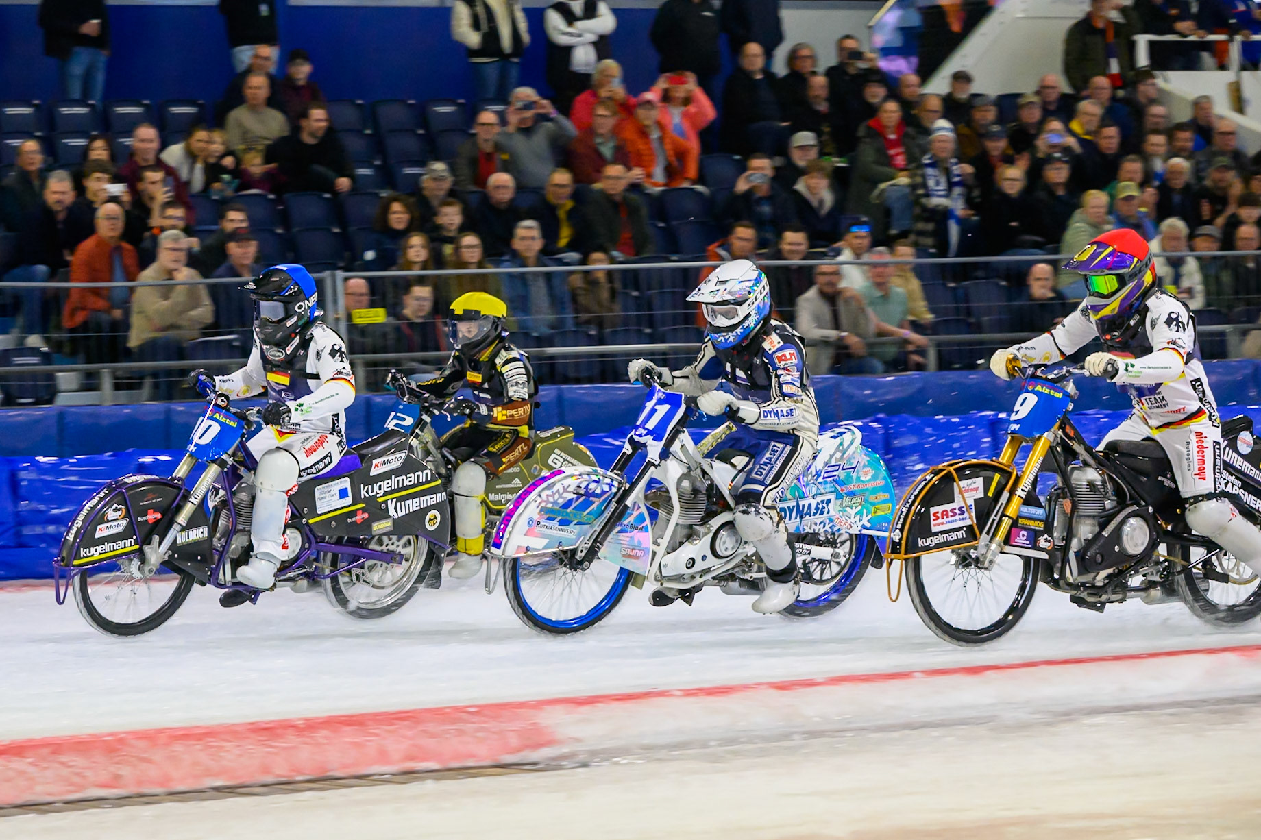 Germany v Finland: (L to R) Christoph Kirchner (10) of Germany in Blue, Heikki Huusko (12) of Finland  in Yellow, Max Koivula (11) of Finland  in White Max Niedermaier (9) of Germany  in Red during the FIM Ice Speedway Of Nations at Ice Rink Thialf, Heerenveen on Sunday 12th April 2026. (Photo: Ian Charles | MI News)