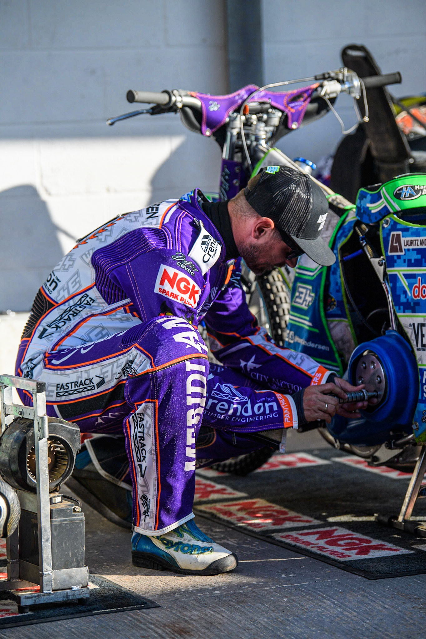 Hans Andersen works on his bike during the Sports Insure Premiership match between Belle Vue Aces and Peterborough at the National Speedway Stadium, Manchester on Monday 19th June 2023. (Photo: Ian Charles | MI News)