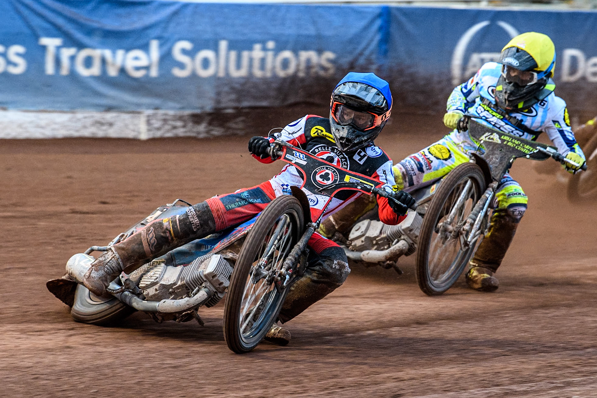 Belle Vue Aces' Ben Cook in Blue leading Oxford Spires' Craig Cook in Yellow during the Rowe Motor Oil Premiership match between Belle Vue Aces and Oxford Spires at the National Speedway Stadium, Manchester on Monday 13th May 2024. (Photo: Ian Charles | MI News)