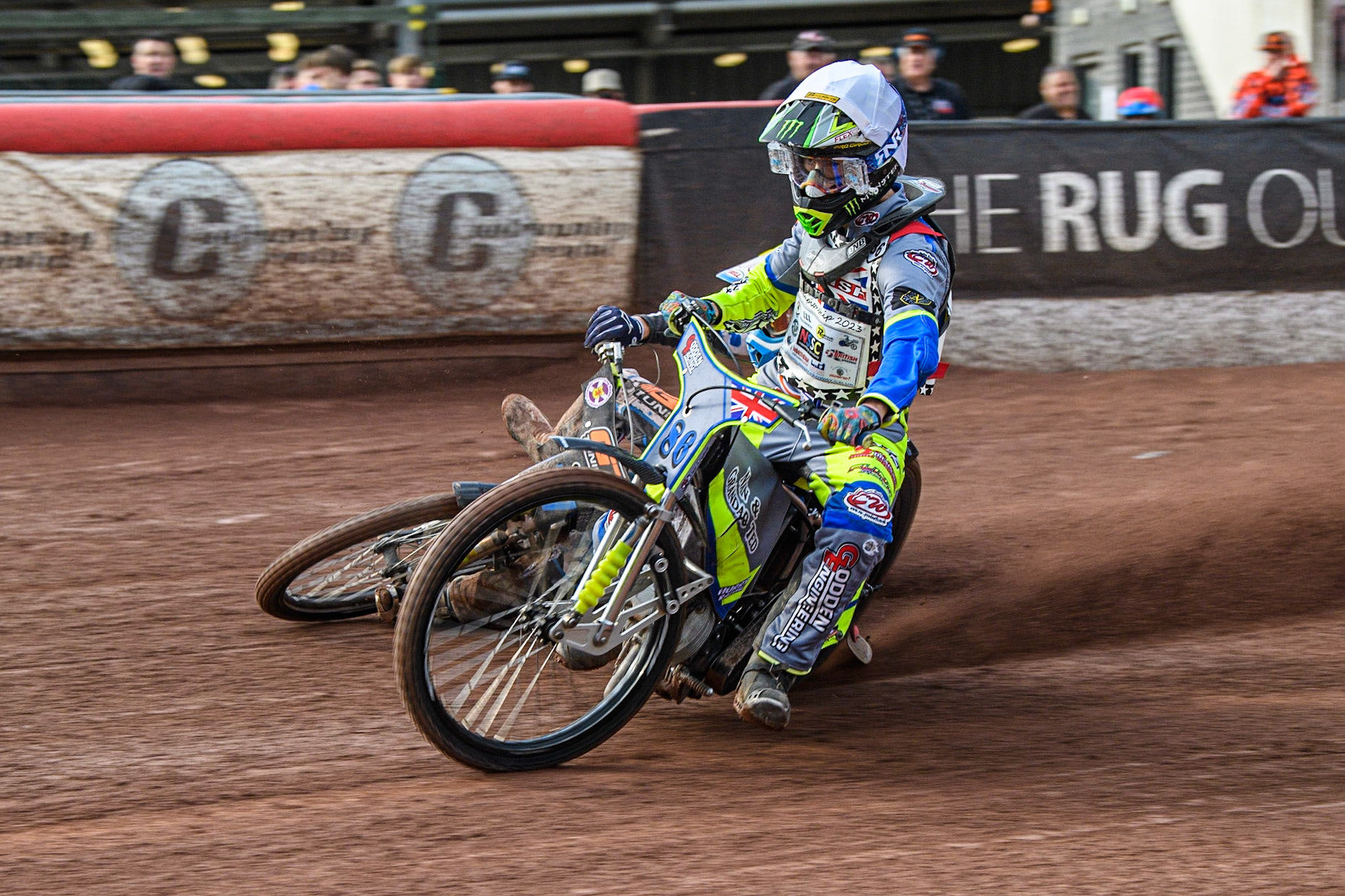 Sonny Springer (White) collides with Billy Budd (Yellow) and causes Budd to fall during the British Youth Speedway Championships at the National Speedway Stadium, Manchester on Friday 21st July 2023. (Photo: Ian Charles | MI News)