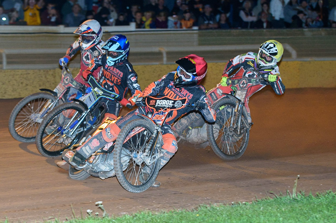 WOLVERHAMPTON, UK. AUGUST 30TH. Luke Becker  (Red) and Ryan Douglas  (Blue) lead Tom Brennan  (Yellow) and Steve Worrall  (White) during the SGB Premiership match between Wolverhampton Wolves and Belle Vue Aces at Monmore Green Stadium, Wolverhampton on Monday 30th August 2021. (Credit: Ian Charles | MI News)