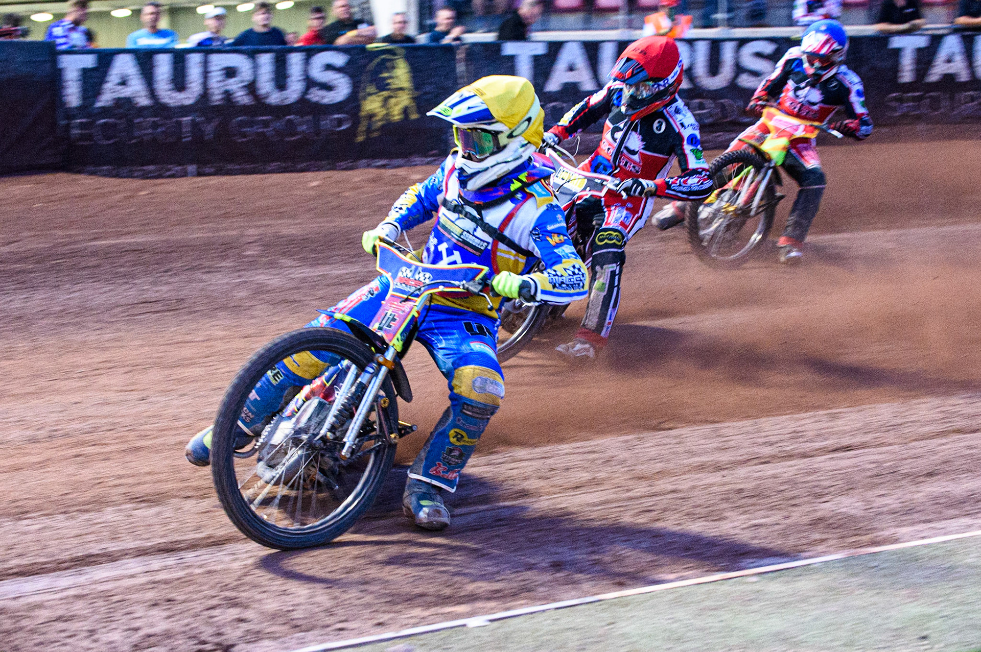 MANCHESTER, UK. JULY 23RD Nathan Ablitt  (Yellow) leads Jack Parkinson-Blackburn  (Red) and Ben Woodhull  (Blue) during the National Development League match between Belle Vue Colts and Eastbourne Seagulls at the National Speedway Stadium, Manchester on Friday 23rd July 2021. (Credit: Ian Charles | MI News)