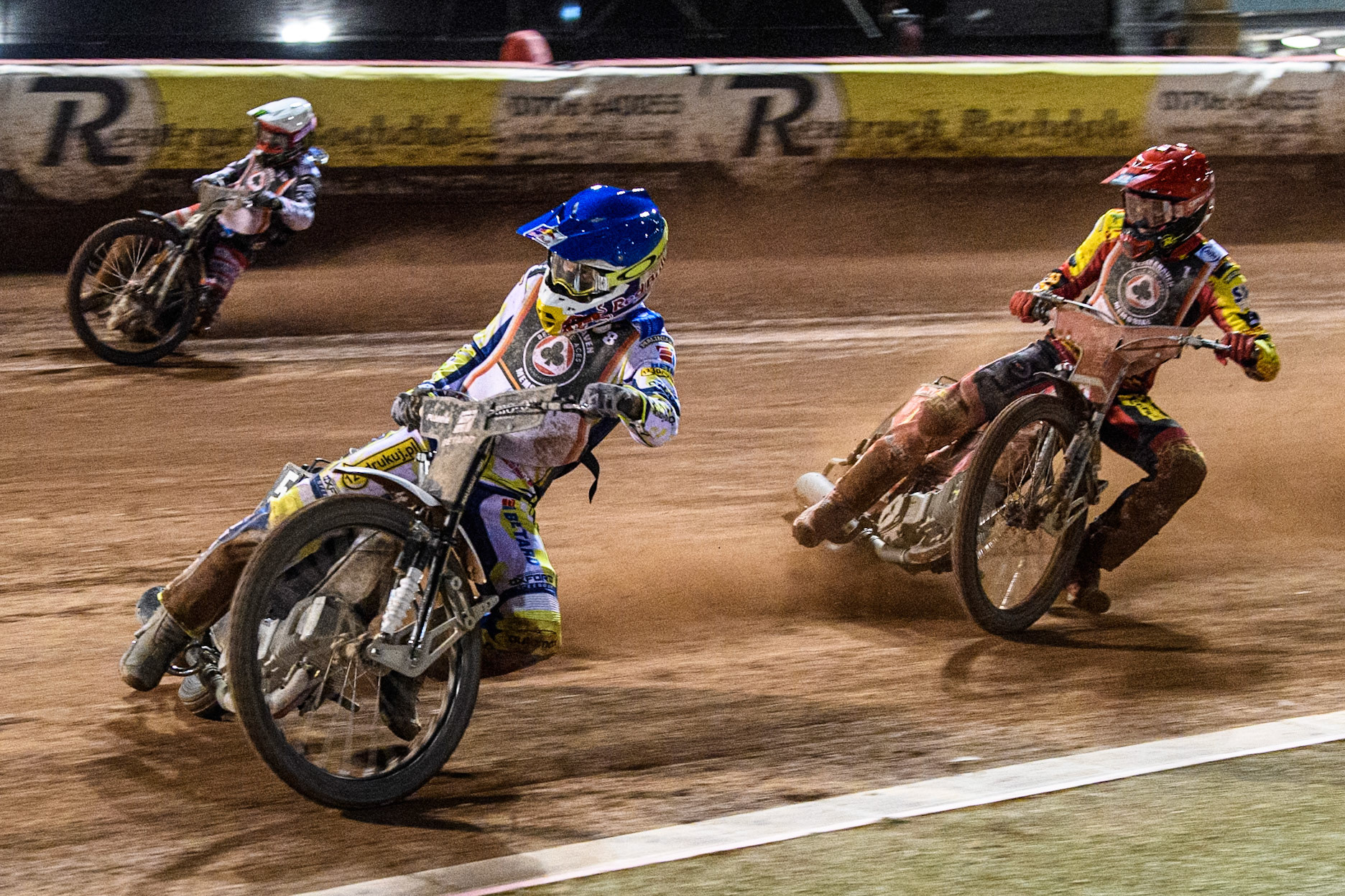 Maciej Janowski in Blue leading Max Fricke in Red and Freddie Lindgren in White during the Peter Craven Memorial Trophy at the National Speedway Stadium, Manchester on Monday 17th March 2025. (Photo: Ian Charles | MI News)