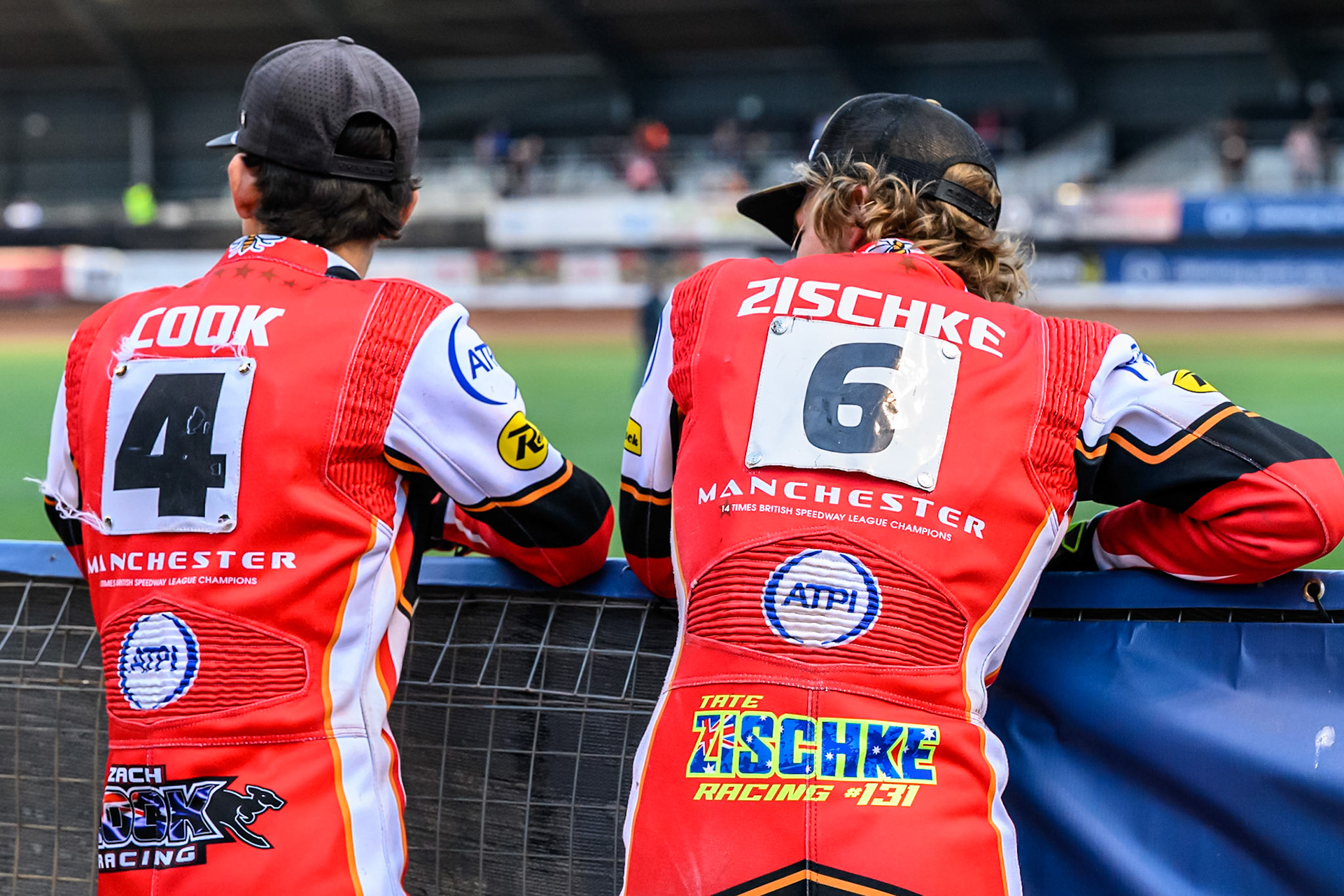 Belle Vue Aces' Zach Cook (Left) and Belle Vue Aces' Tate Zischke watch the track prep during the Rowe Motor Oil Premiership match between Belle Vue Aces and King's Lynn Stars at the National Speedway Stadium, Manchester on Monday 23rd June 2025. (Photo: Ian Charles | MI News)