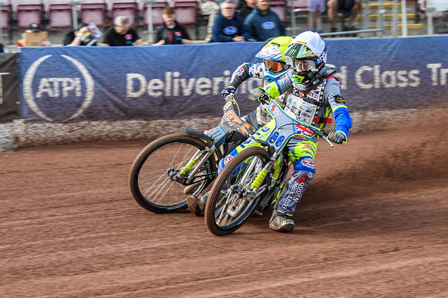 Sonny Springer (White) collides with Billy Budd (Yellow) and causes Budd to fall during the British Youth Speedway Championships at the National Speedway Stadium, Manchester on Friday 21st July 2023. (Photo: Ian Charles | MI News)