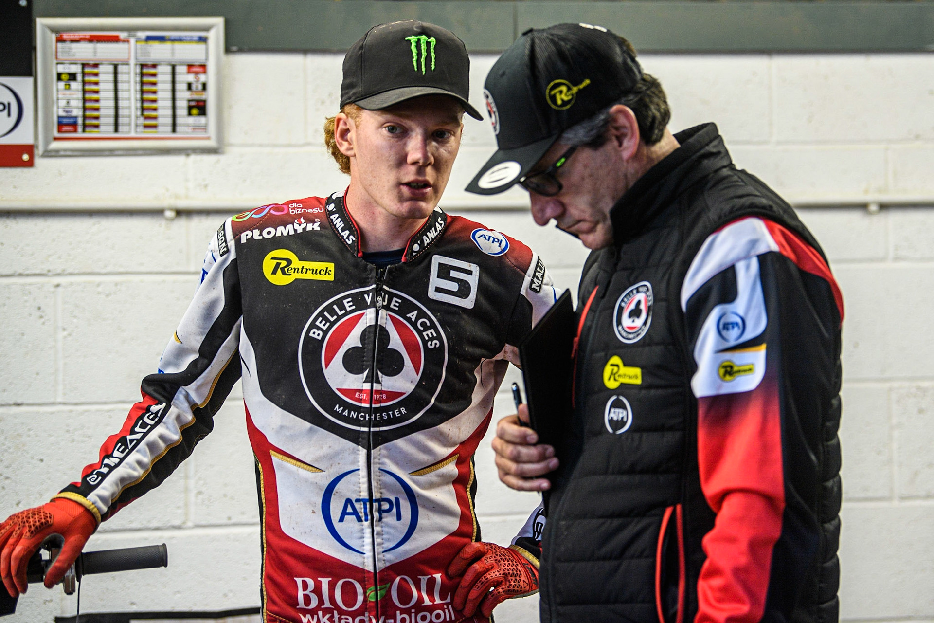 Dan Bewley (left) chats with Belle Vue ATPI Aces Team Manager Mark Lemon during the Sports Insure Premiership match between Belle Vue Aces and Sheffield Tigers at the National Speedway Stadium, Manchester on Monday 7th August 2023. (Photo: Ian Charles | MI News)