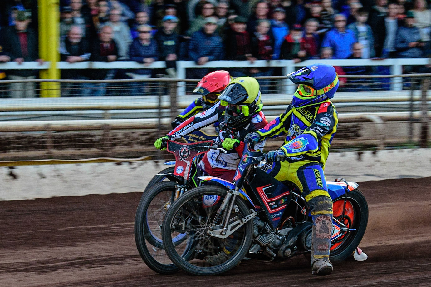 SHEFFIELD, UK. MAY 26TH  Stefan Nielsen  loses control and collides with Tom Brennan  (Yellow) with Kyle Howarth  (Red) on the outside during the SGB Premiership match between Sheffield Tigers and Belle Vue Aces at Owlerton Stadium, Sheffield on Thursday 26th May 2022. (Credit: Ian Charles | MI News)