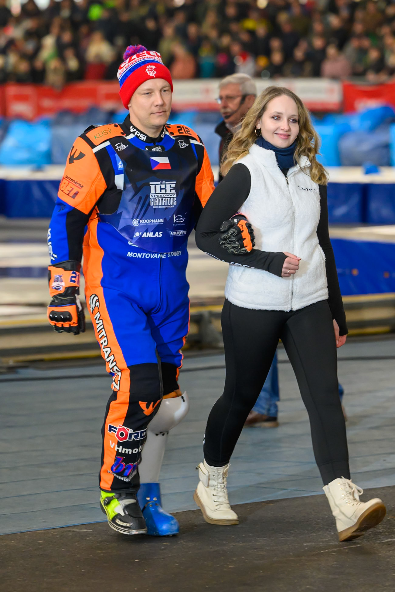 Lukas Hutla (212) of Czechia is accompanied by a start girl  during the Ice Speedway Gladiators World Championship Final 2 at Max-Aicher-Arena, Inzell on Sunday 15th March 2026. (Photo: Ian Charles | MI News)