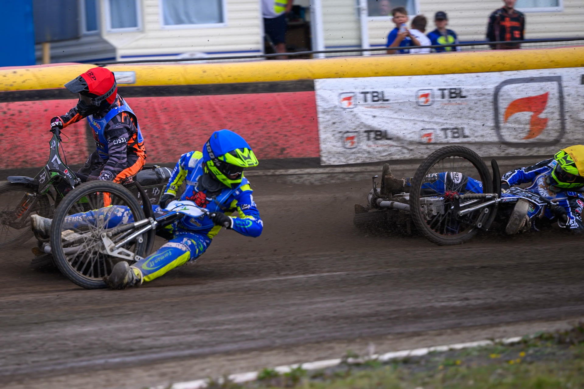 Will Boraston of Buxton Bulls in Yellow falls in the path of Ollie Binns of Kings Lynn Young Stars during the WSRA National Development League match between Buxton Bulls and King's Lynn Young Stars at Hi-Edge Speedway, Buxton on Sunday 9th August 2026. (Photo: Ian Charles | MI News)