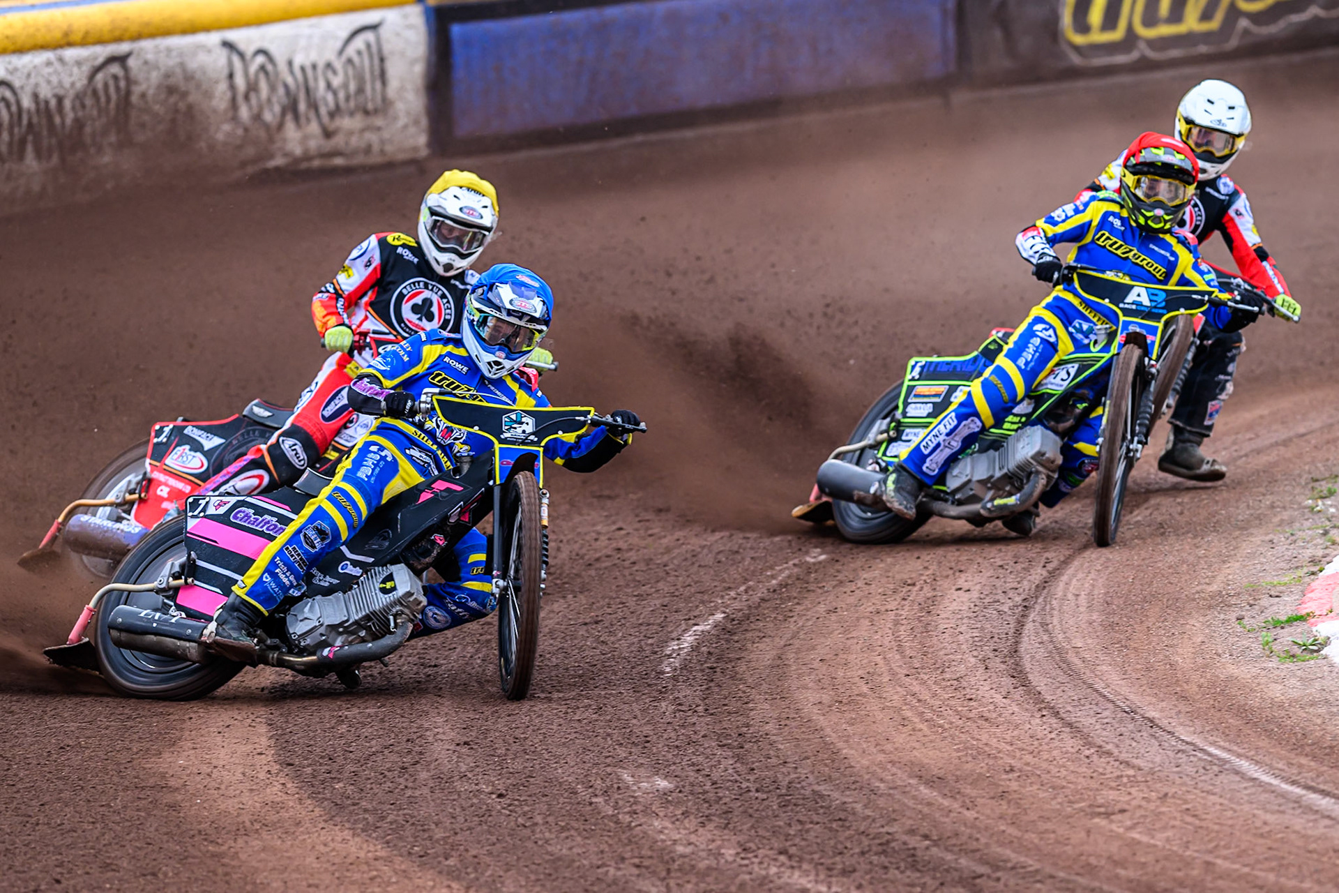 Leon Flint of Sheffield Tigers  in Blue leading Jake Mulford of Belle Vue Aces   in Yellow, Jye Etheridge of Sheffield Tigers  in Red  and Tate Zischke of Belle Vue Aces   in White during the Rowe Motor Oil Premiership match between Sheffield Tigers and Belle Vue Aces at Owlerton Stadium, Sheffield on Monday 11th August 2025. (Photo: Ian Charles | MI News)