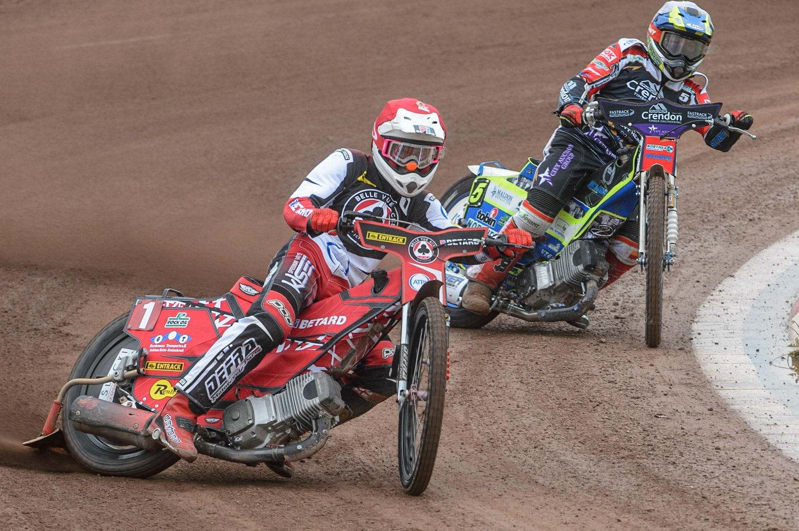 MANCHESTER, UK. MAY 2ND  Max Fricke  (Red) leads Chris Harris  (White) during the SGB Premiership match between Belle Vue Aces and Peterborough at the National Speedway Stadium, Manchester on Monday 2nd May 2022. (Credit: Ian Charles | MI News)