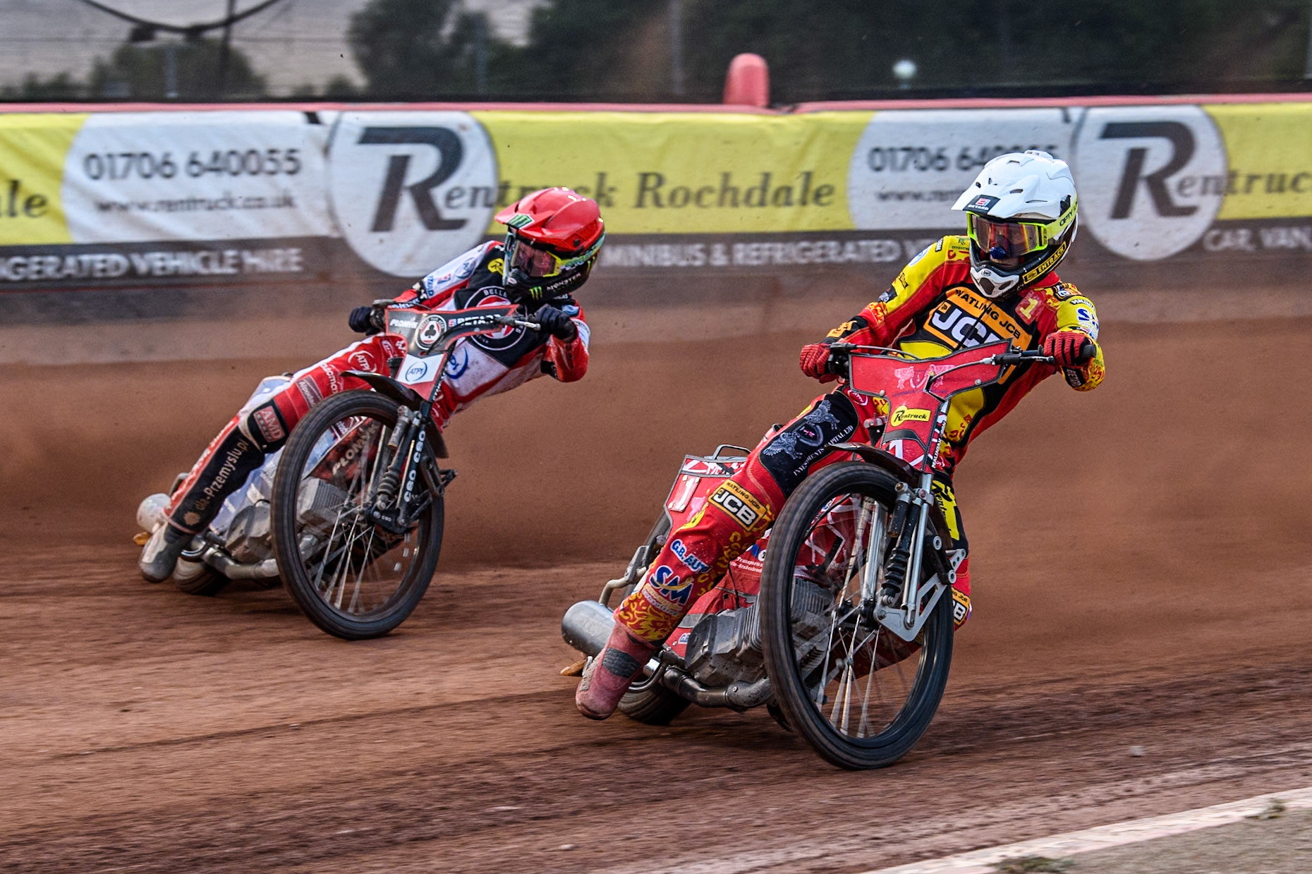Leicester Lions' Max Fricke in White rides inside Belle Vue Aces' Dan Bewley in Red during the Rowe Motor Oil Premiership match between Belle Vue Aces and Leicester Lions at the National Speedway Stadium, Manchester on Monday 24th June 2024. (Photo: Ian Charles | MI News)