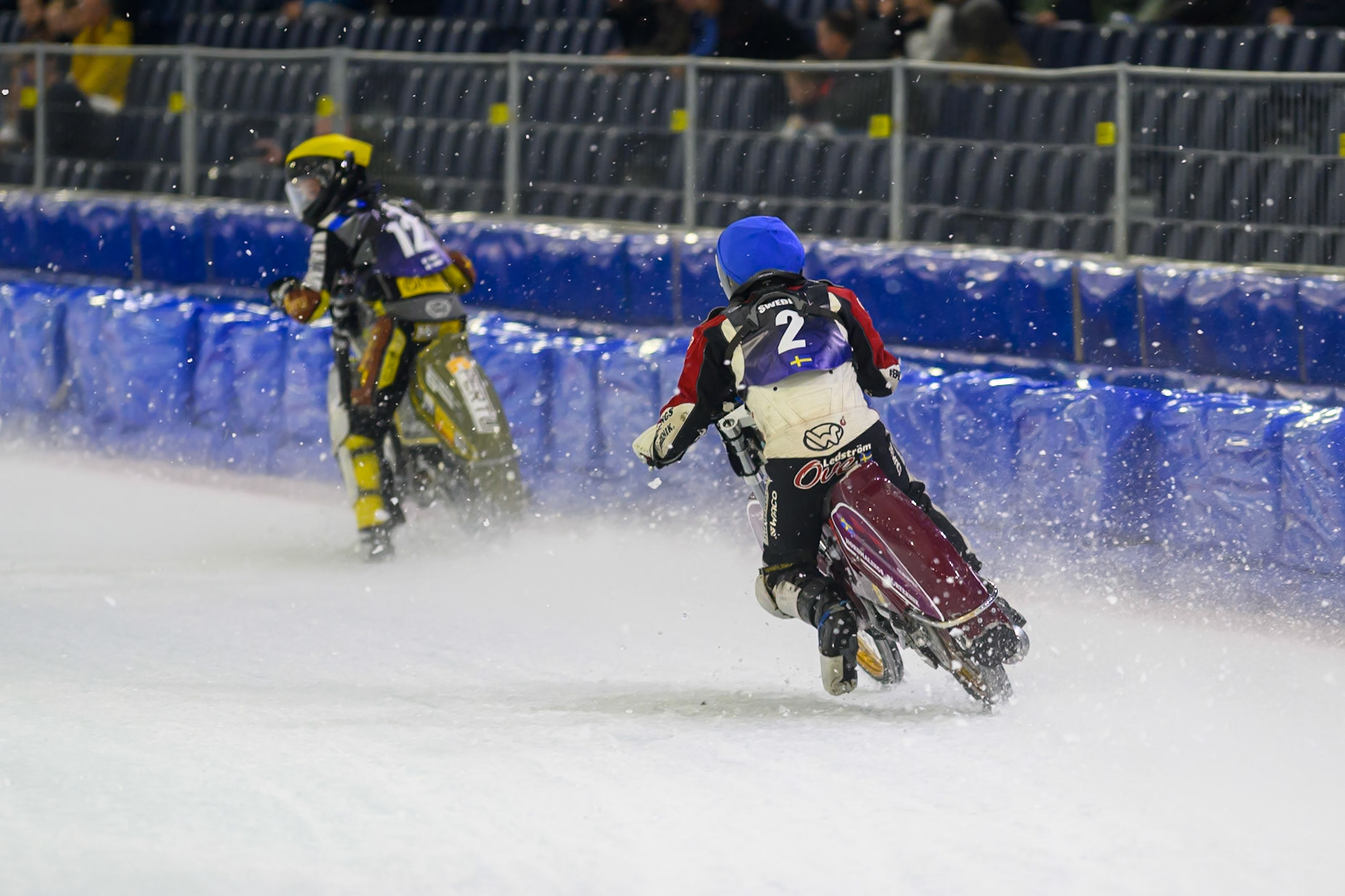 Ove Ledstrom (2) of Sweden  in Blue chases Heikki Huusko (12) of Finland  in Yellow during the FIM Ice Speedway Of Nations at Ice Rink Thialf, Heerenveen on Sunday 12th April 2026. (Photo: Ian Charles | MI News)