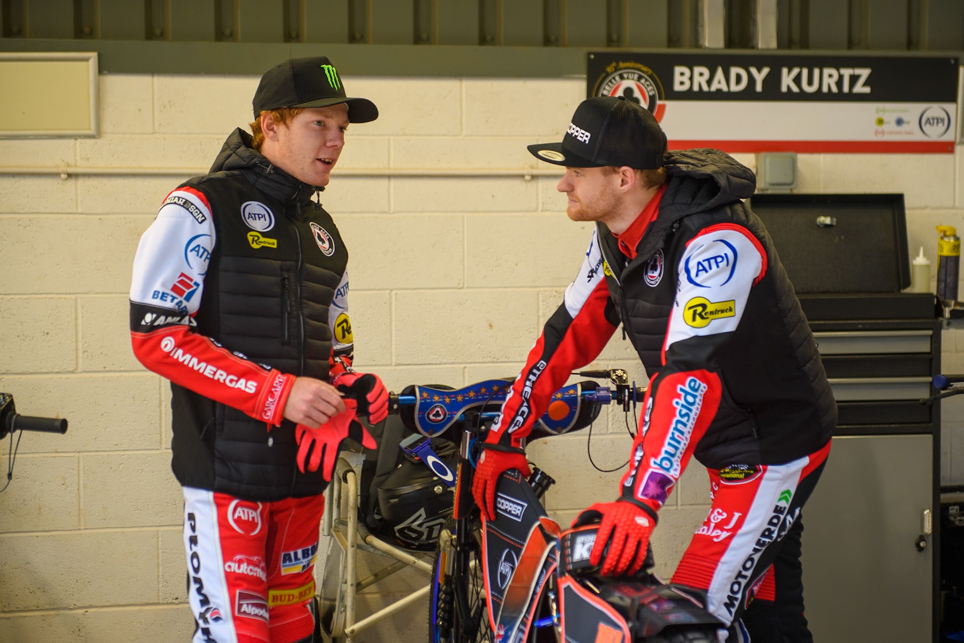 Dan Bewley (left) chats with Brady Kurtz during the Belle Vue Aces Media Day at the National Speedway Stadium, Manchester on Monday 11th March 2024. (Photo: Ian Charles | MI News)