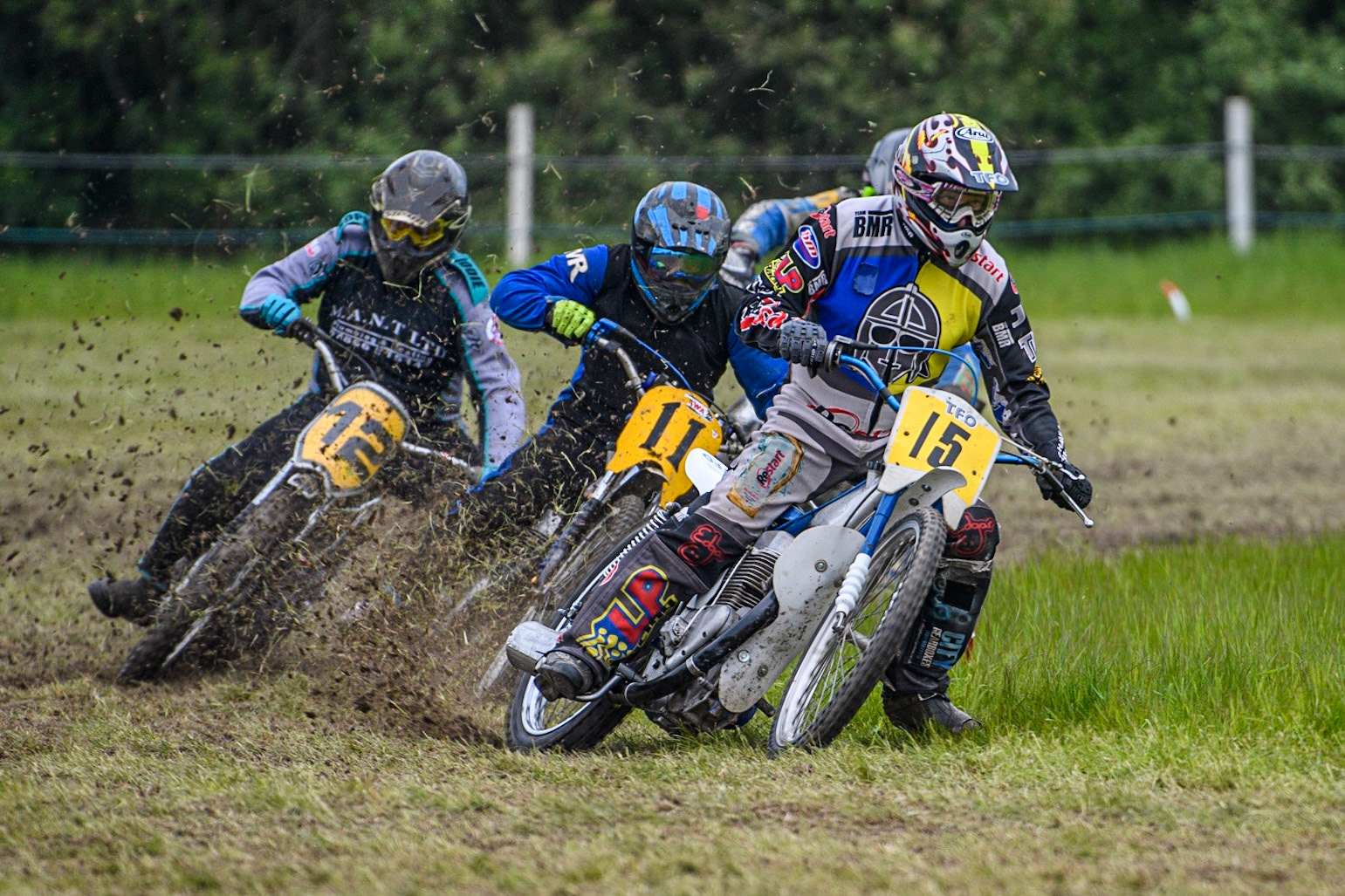 John Priest (15) leads Tony Atkin (11) and Martin Adams (12) in the Pre-75 Solo Class during the Cheshire Grass Track Three Trophies meeting at High Legh, Cheshire on Sunday 14th May 2023. (Photo: Ian Charles | MI News)