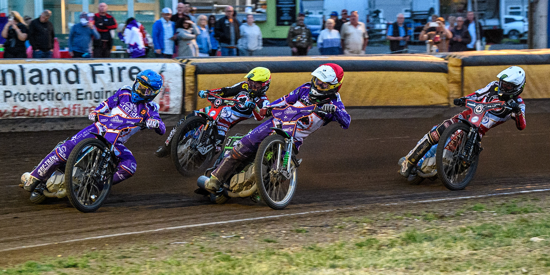 Vadim Tarasenko (Blue) leads Benjamin Basso (Red) Jaimon Lidsey (Yellow) and Dan Bewley (White) during the Sports Insure Premiership match between Peterborough and Belle Vue Aces at East of England Showground, Peterborough on Monday 26th June 2023. (Photo: Ian Charles | MI News)