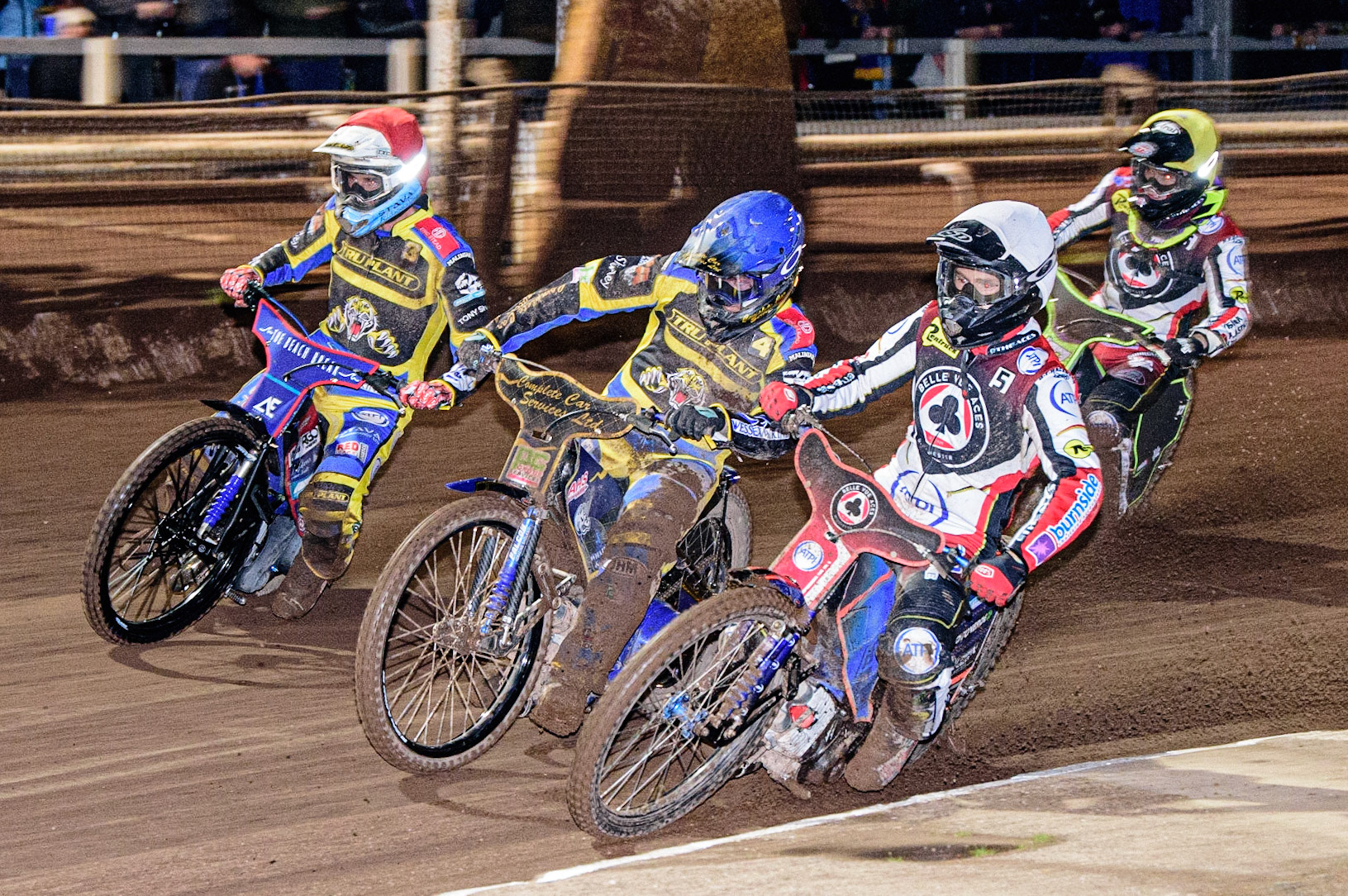 Brady Kurtz  (White) inside Kyle Howarth  (Blue) and Adam Ellis  (Red) with Tom Brennan  (Yellow) behind during the Sheffield Tigers vs Belle Vue Aces meeting in the SGP Premiership at Owlerton Stadium, Sheffield on Thursday 23rd March 2023. (Photo: Ian Charles | MI News)