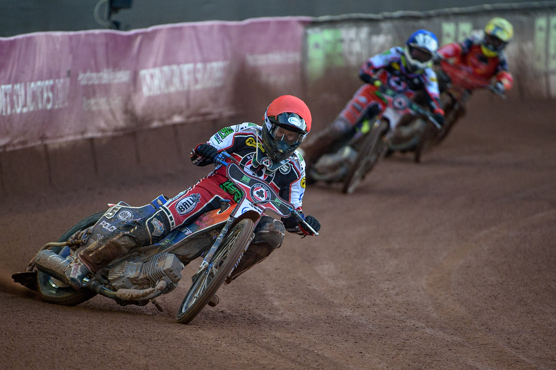 MANCHESTER, UK. AUG 9TH  Brady Kurtz  (Red) leads Tom Brennan  (Blue)  and Scott Nicholls  (Yellow) during the SGB Premiership match between Belle Vue Aces and Peterborough at the National Speedway Stadium, Manchester on Monday 9th August 2021. (Credit: Ian Charles | MI News)